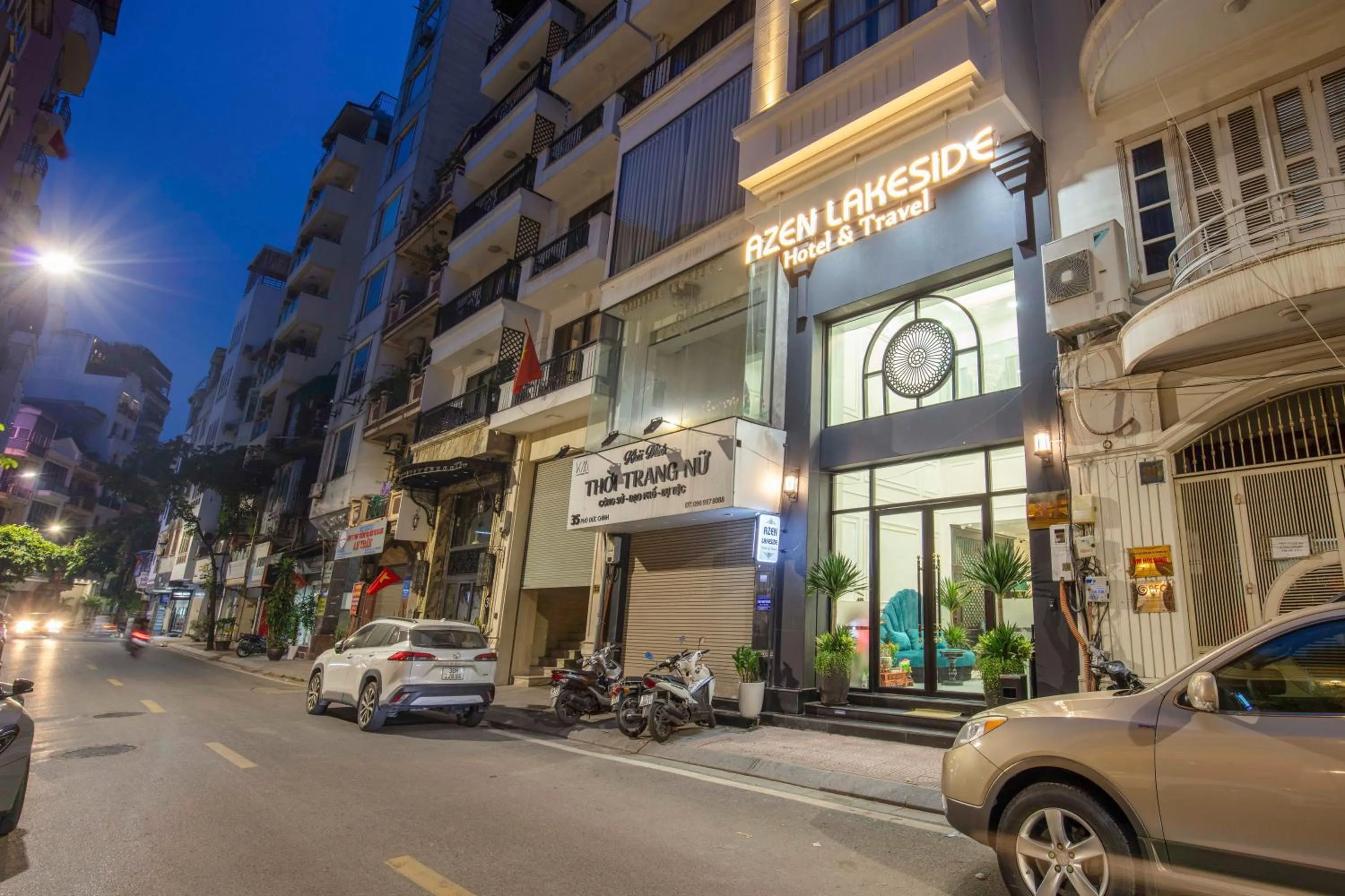 Property building in Azen Lakeside Hotel & Travel