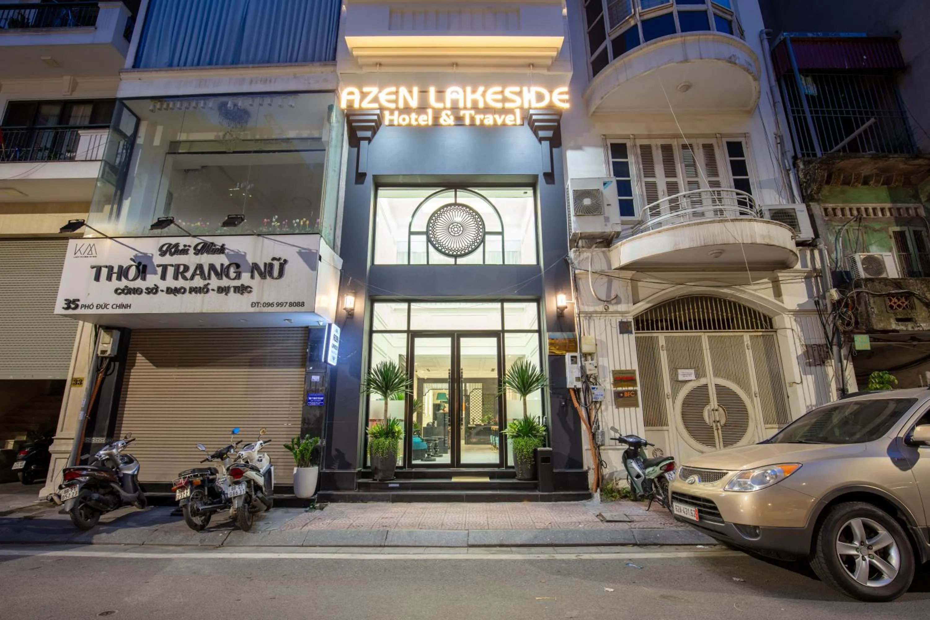 Property building in Azen Lakeside Hotel & Travel