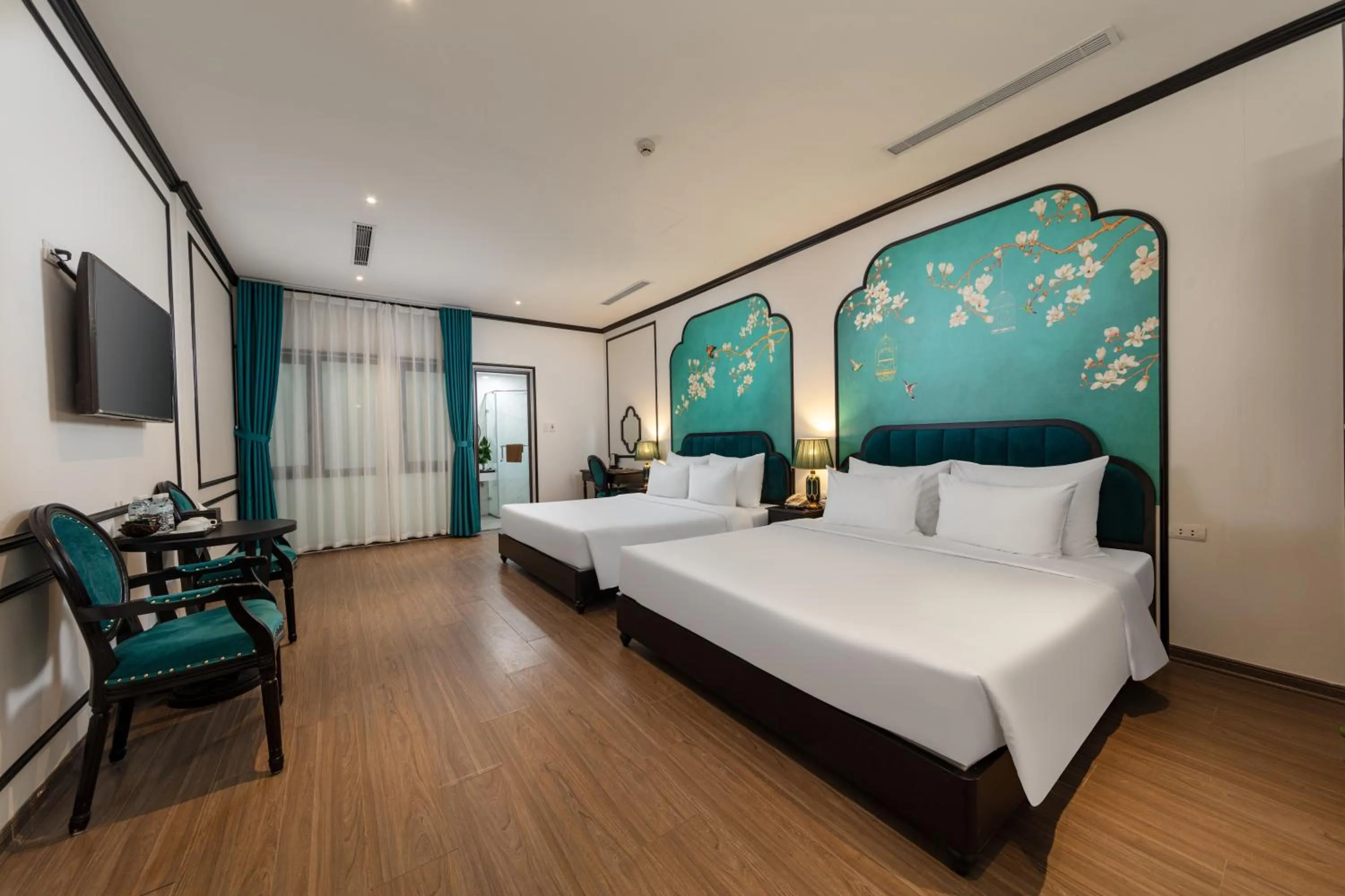 Communal lounge/ TV room, Bed in Azen Lakeside Hotel & Travel