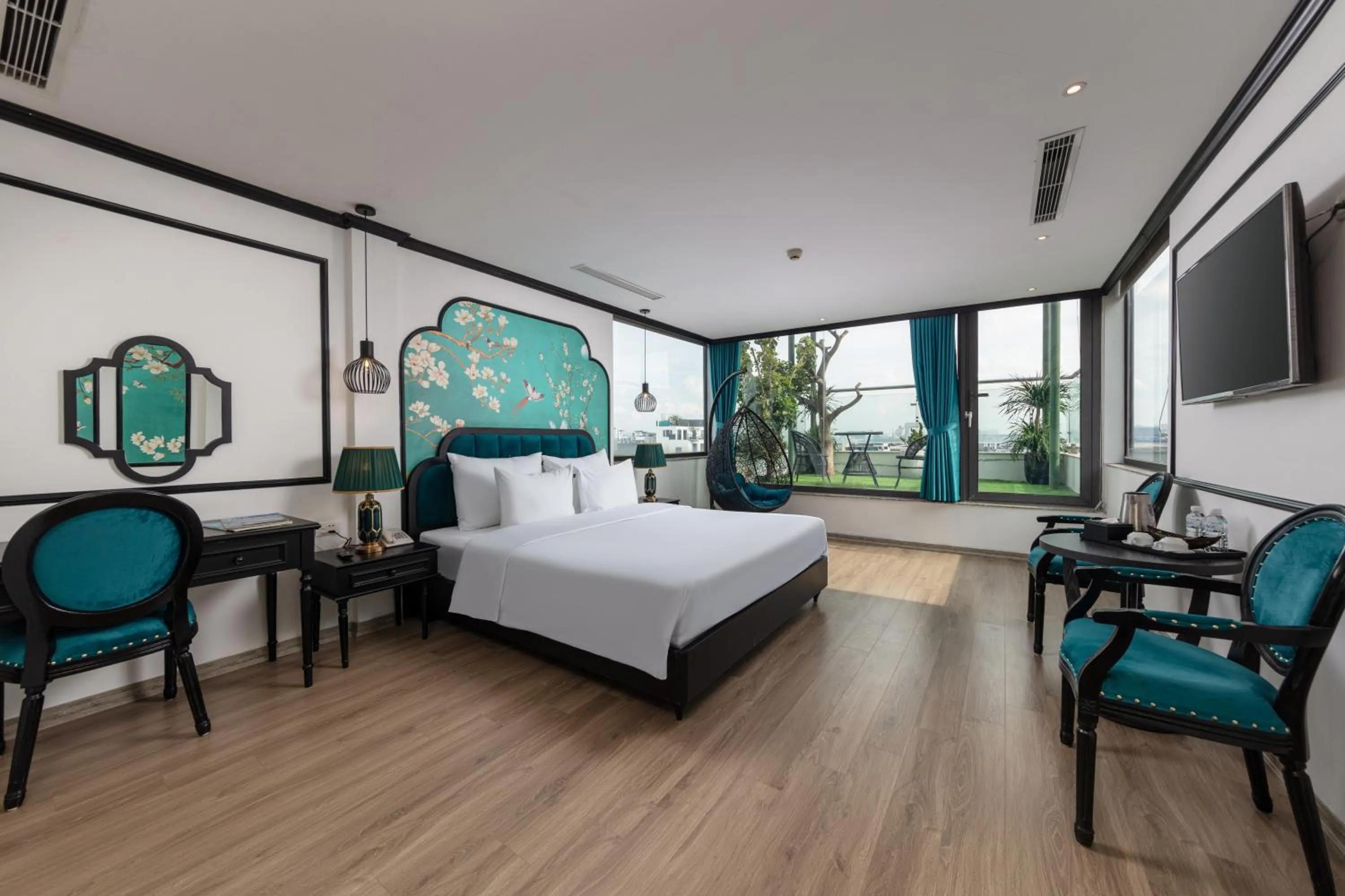 Communal lounge/ TV room, Bed in Azen Lakeside Hotel & Travel