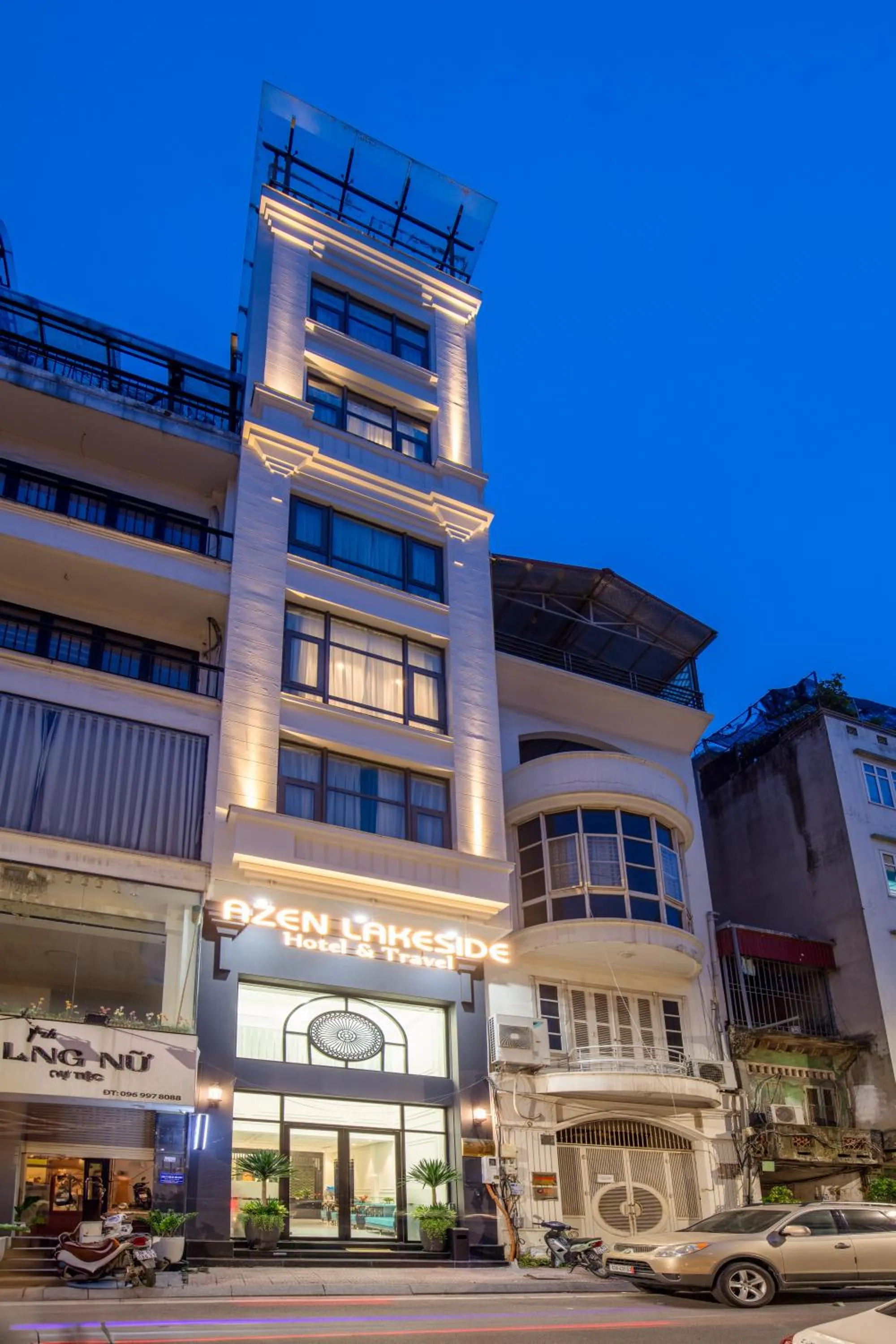 Property building in Azen Lakeside Hotel & Travel