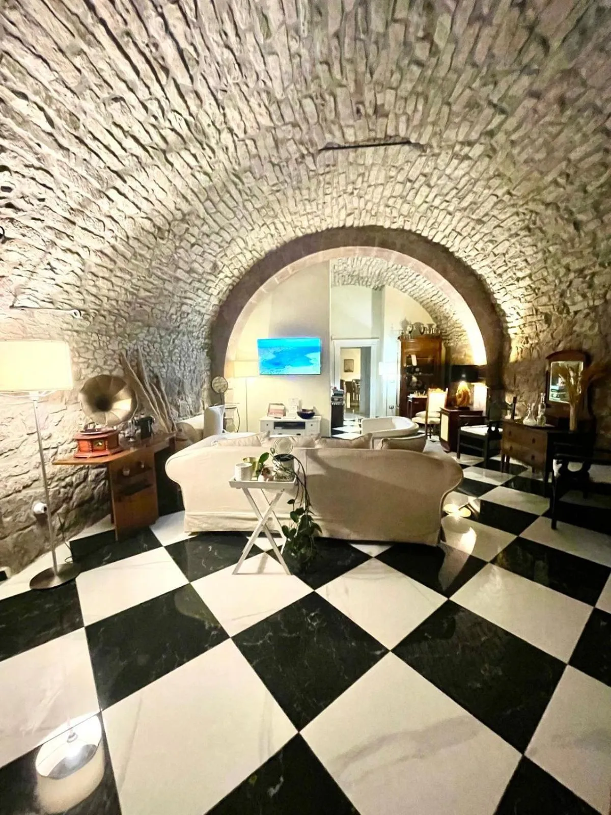 Communal lounge/ TV room in Palazzo Pischedda