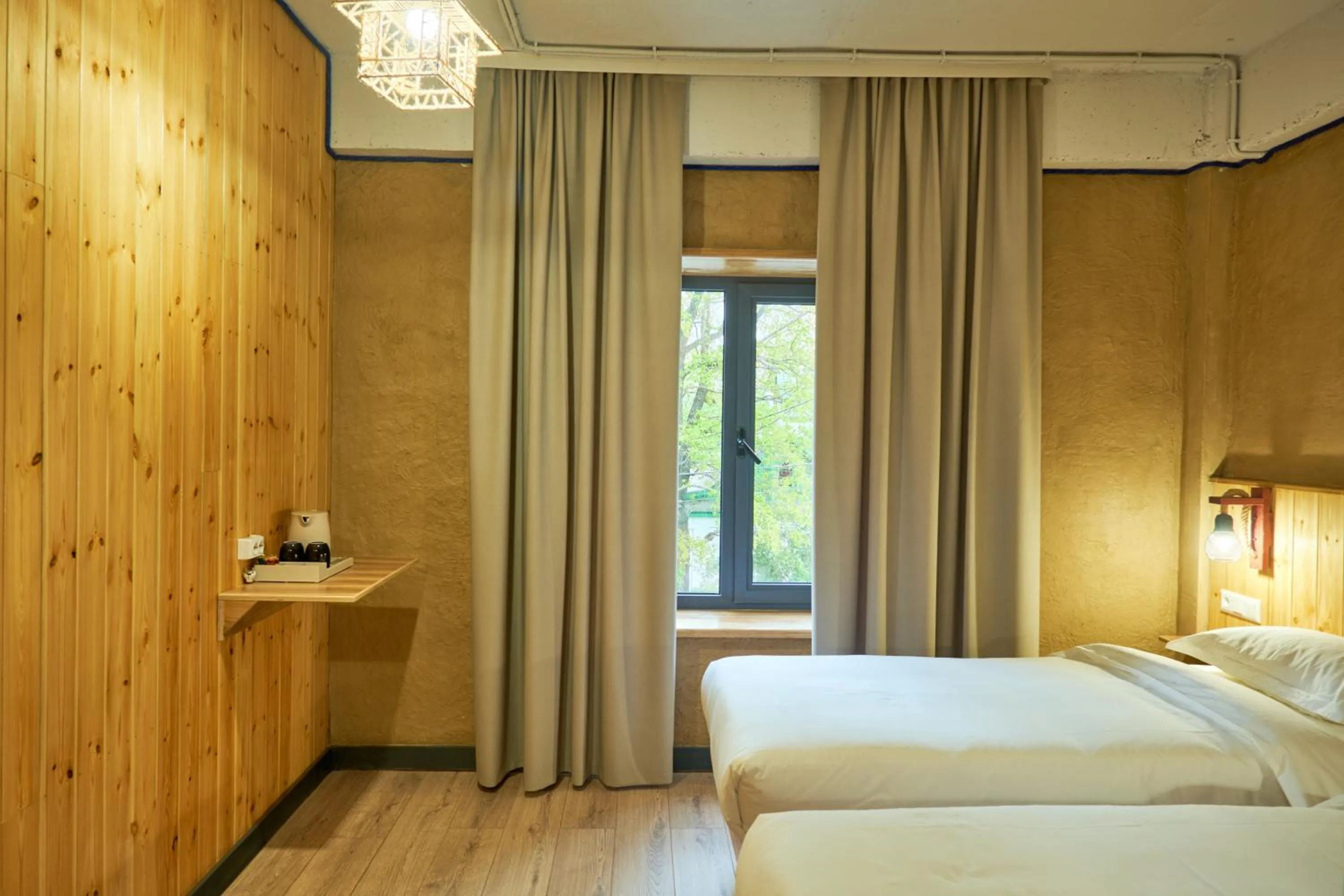 Bed in Pristine Hotel