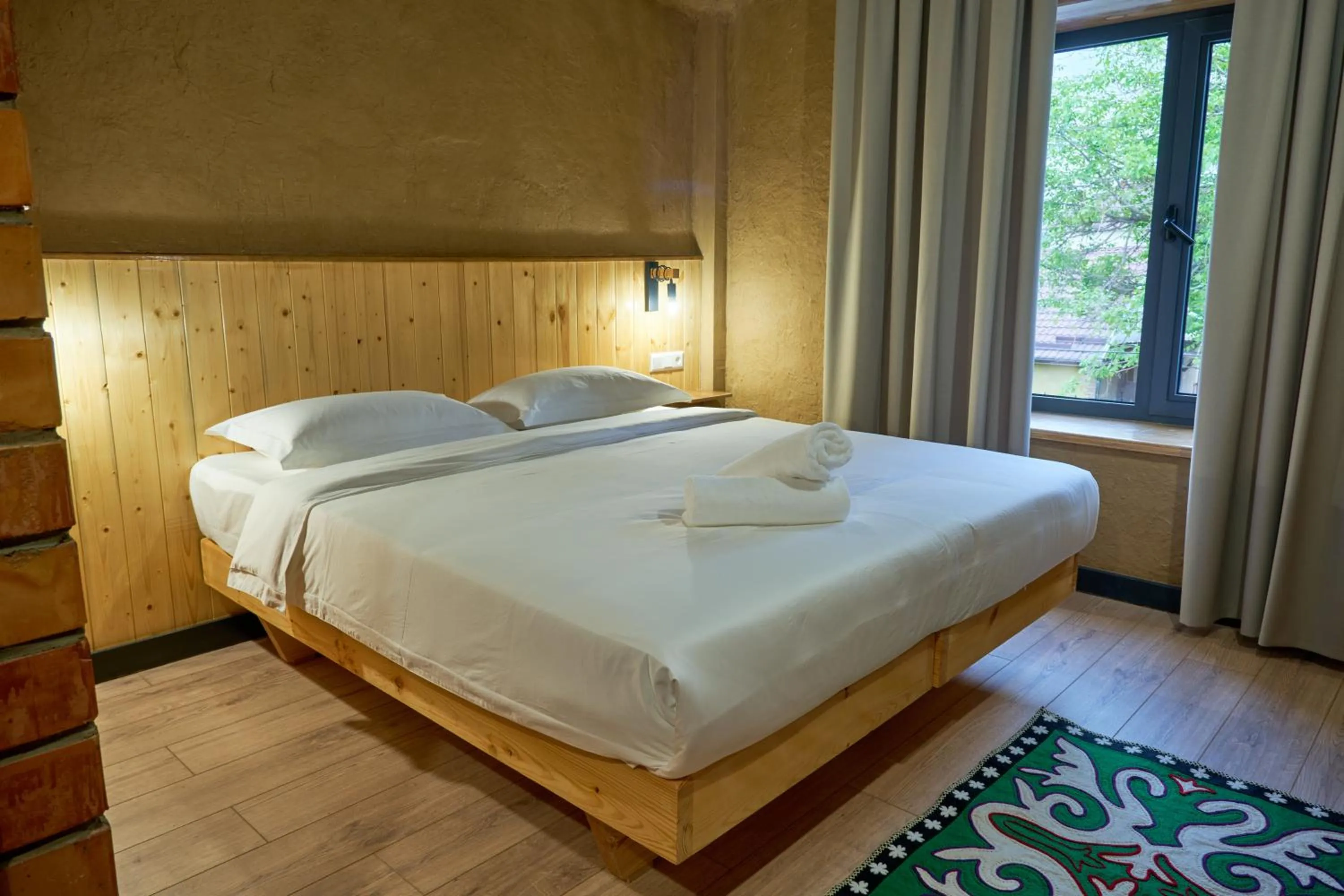 Bed in Pristine Hotel