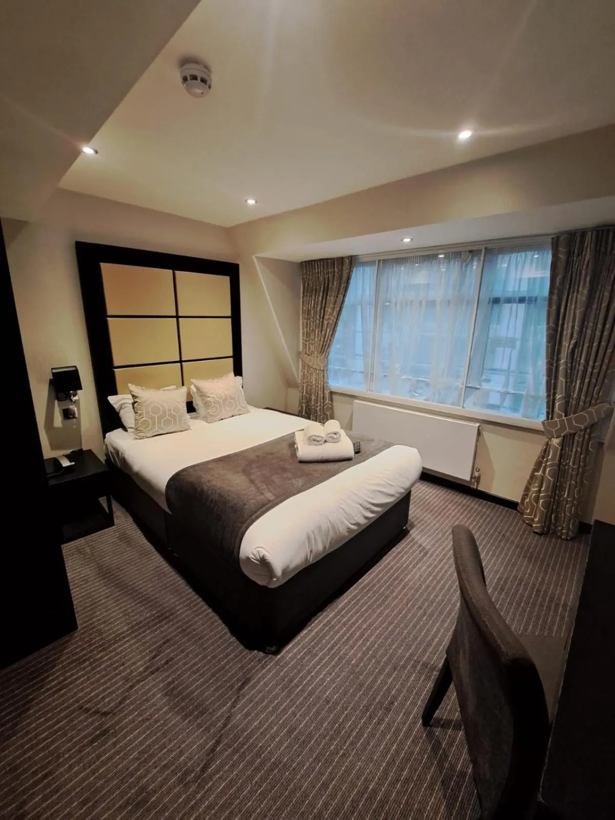 Bed in Great St Helen Hotel