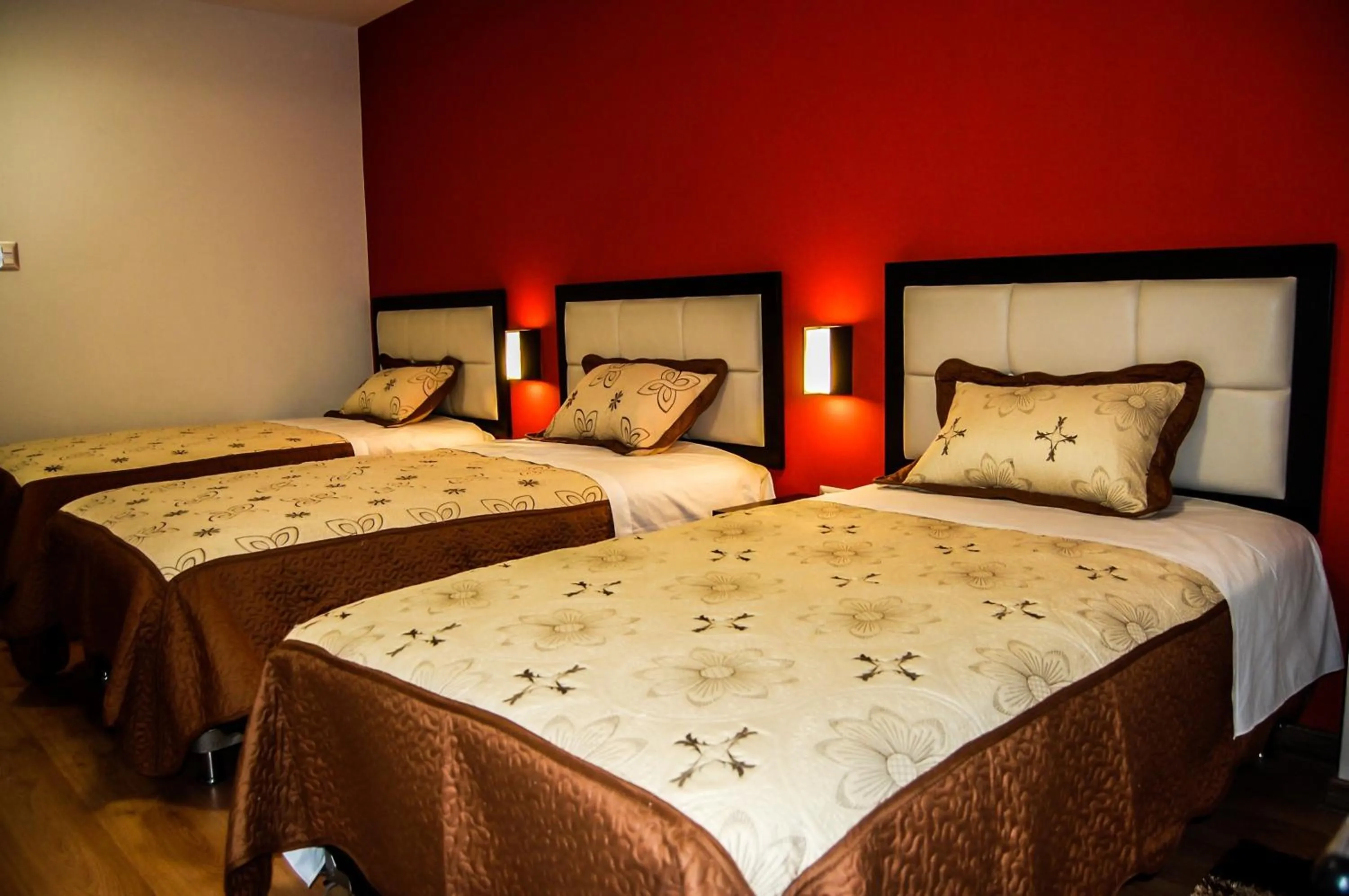 Bed in Plaza Sur Hotel & Suites