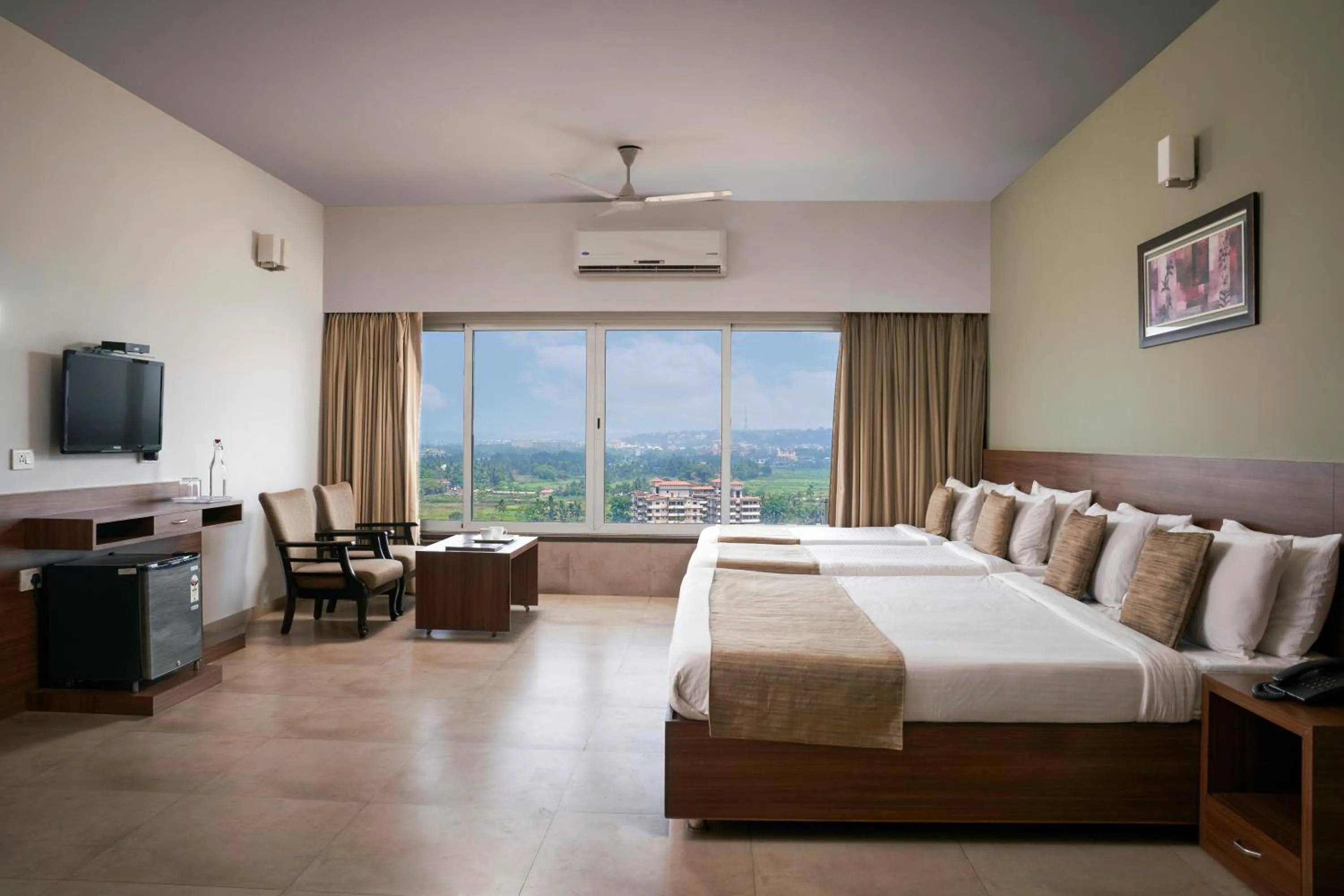 Photo of the whole room, Bed in Athome Comforts Panjim Donapaula