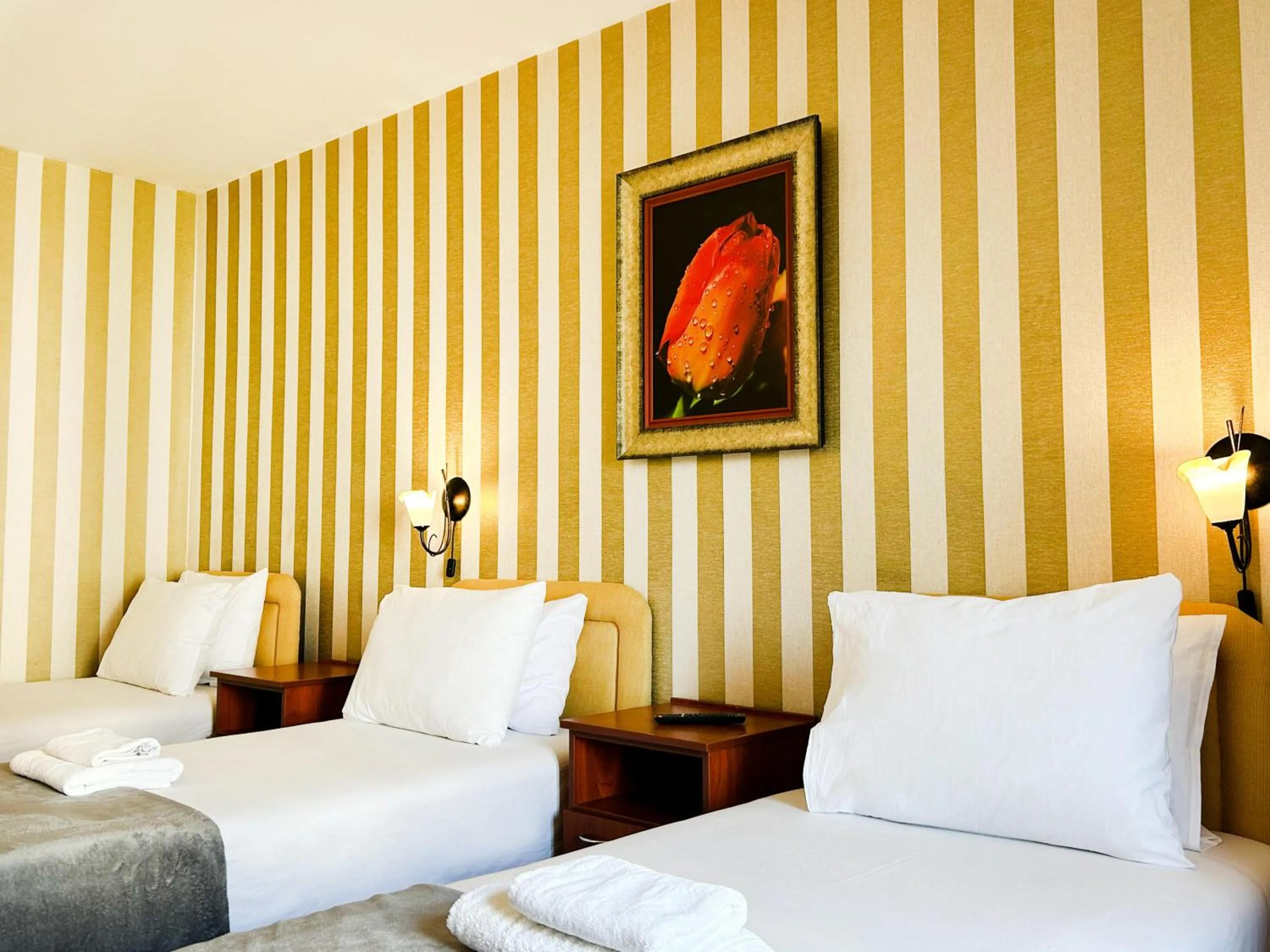 Photo of the whole room, Bed in Central Hotel & Restaurant