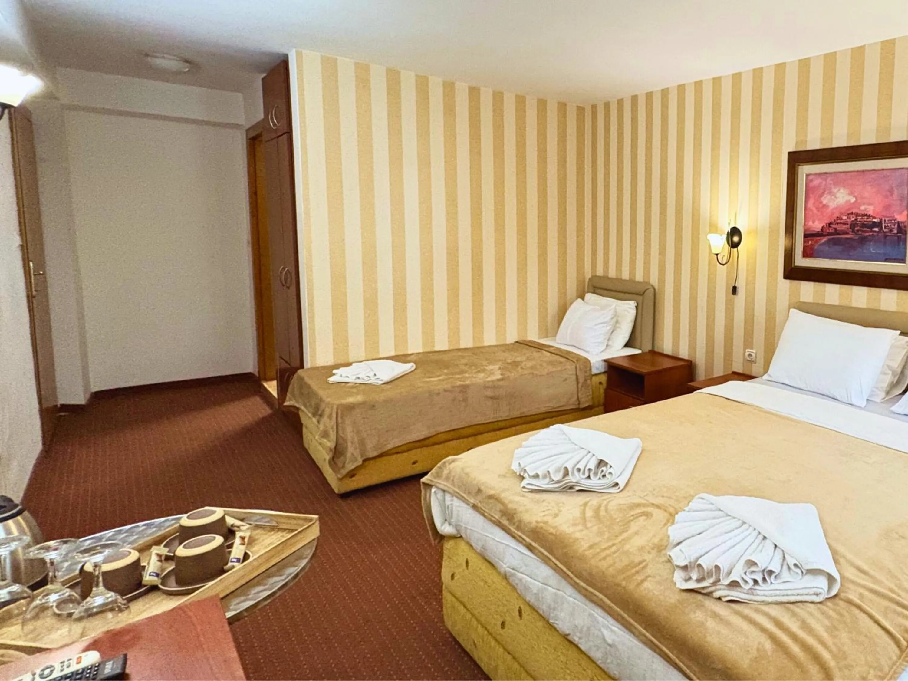 Bed in Central Hotel & Restaurant