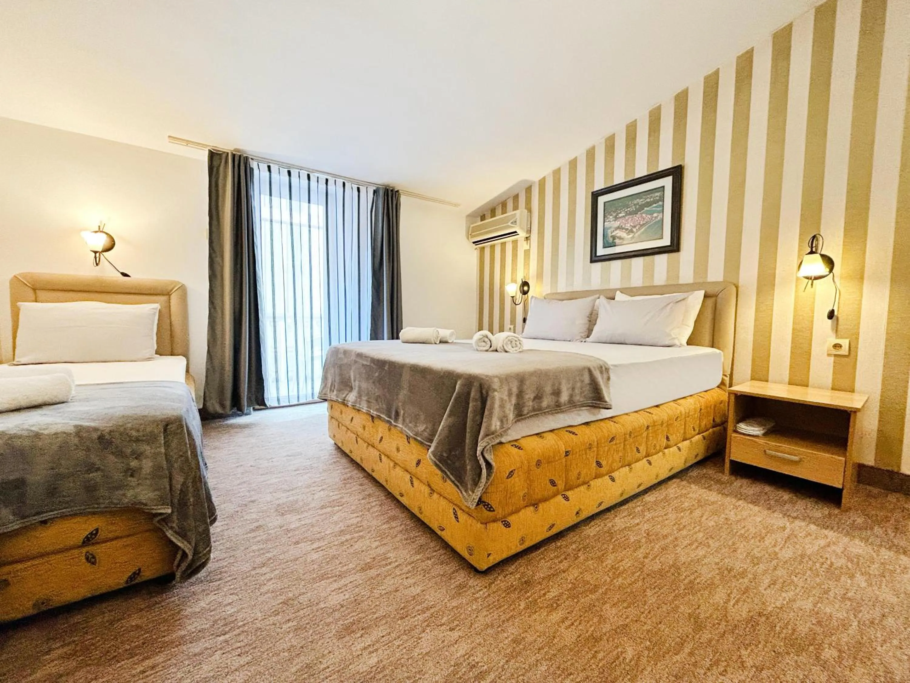 Bed in Central Hotel & Restaurant