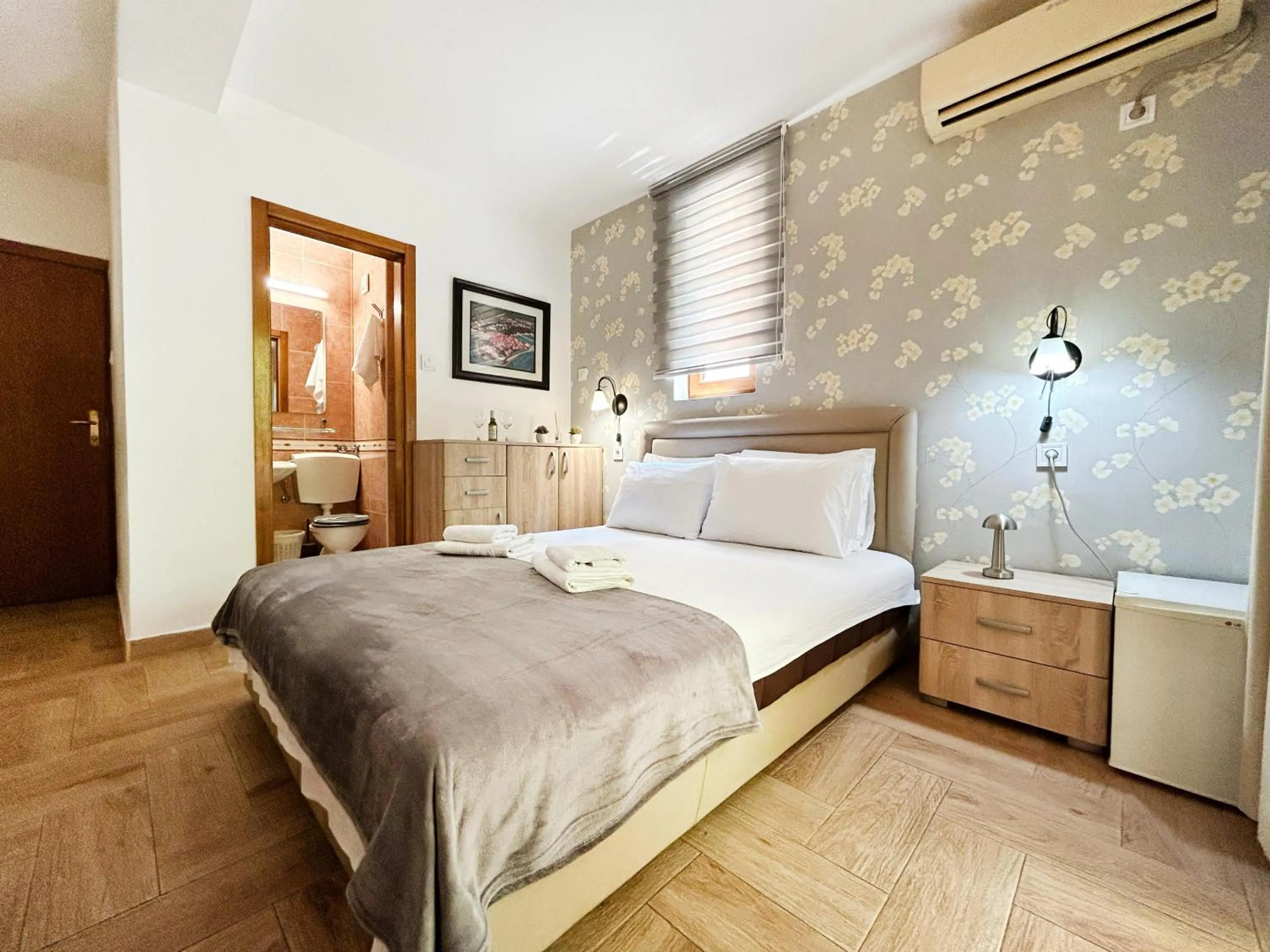 Bed in Central Hotel & Restaurant