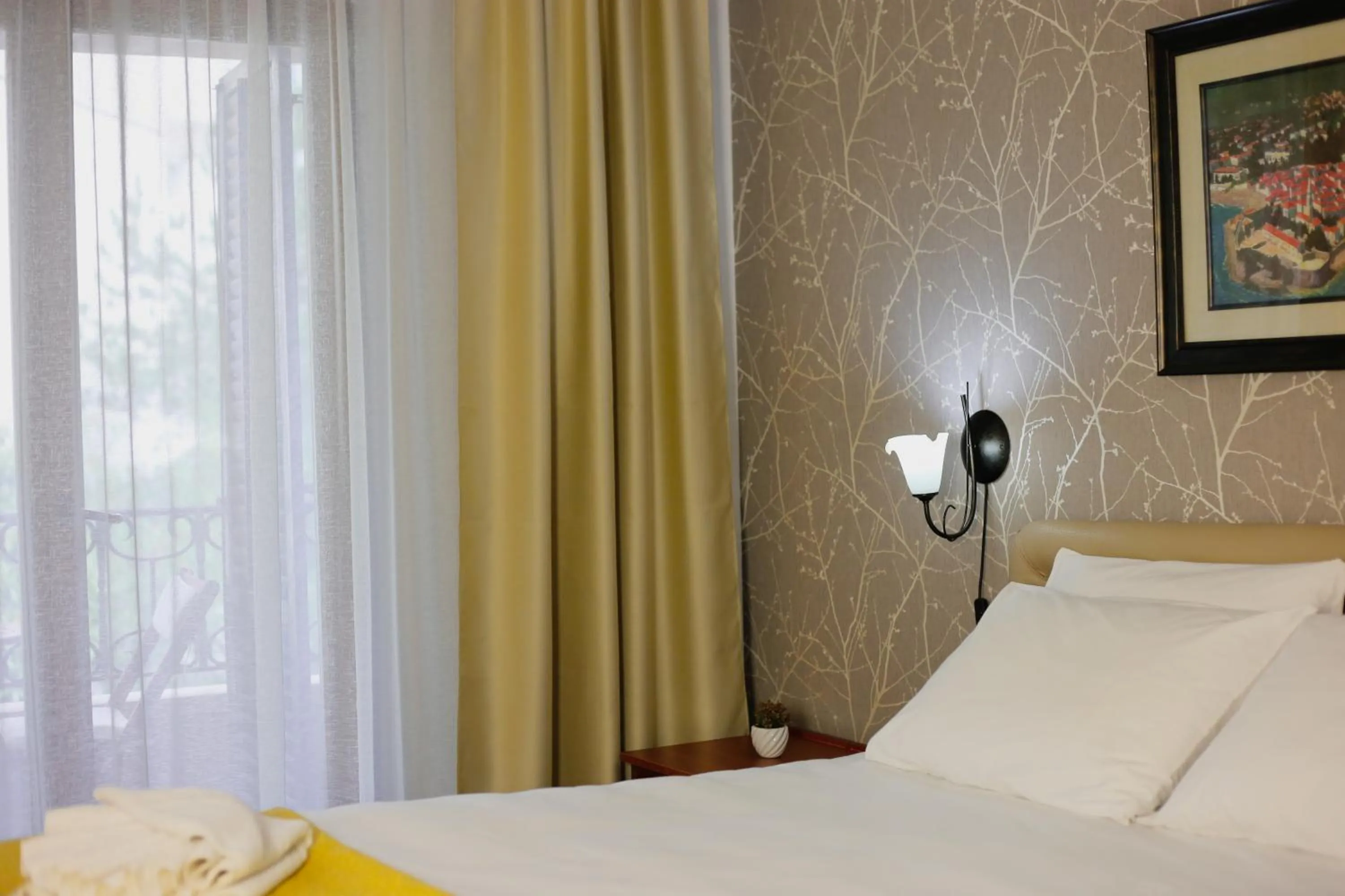 Bed in Central Hotel & Restaurant