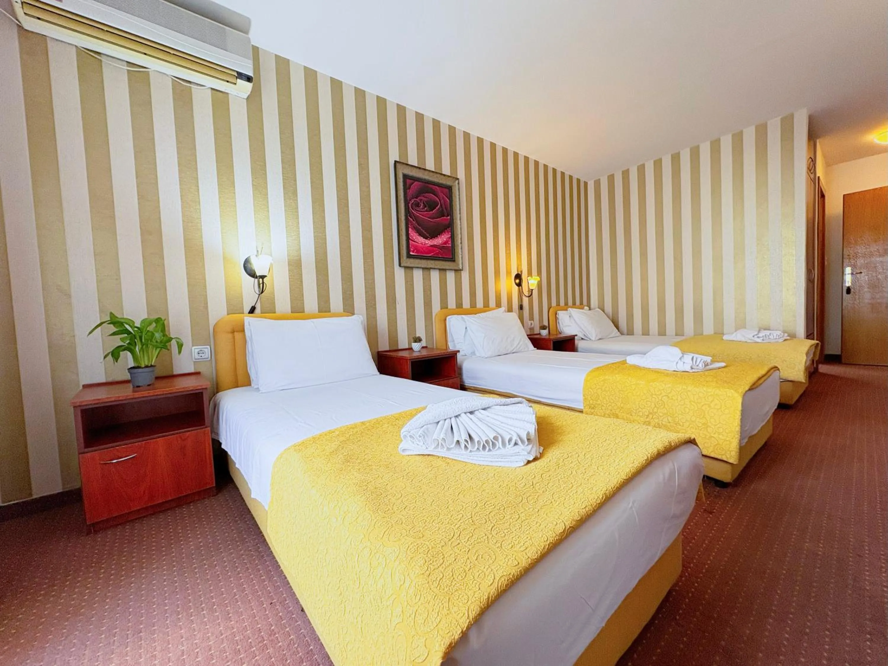 Bed in Central Hotel & Restaurant