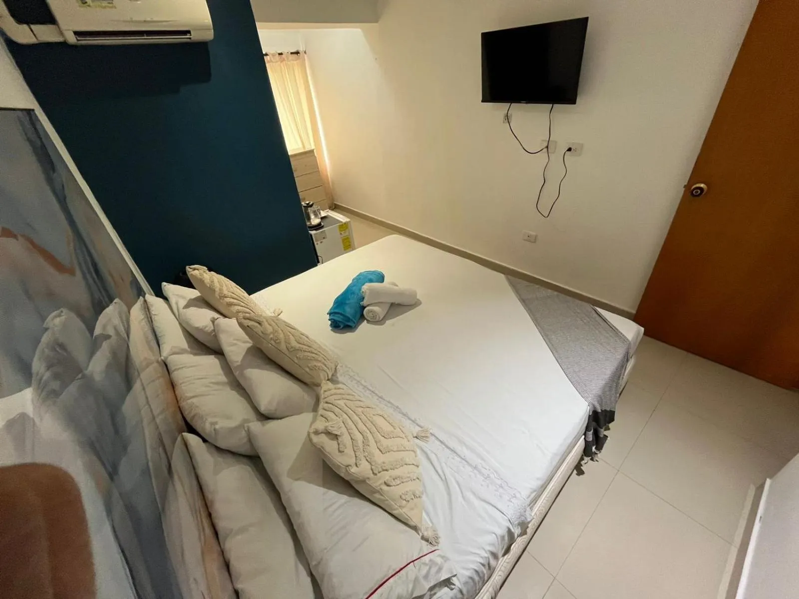 Bed in Sweet Caribbean Airport Hotel