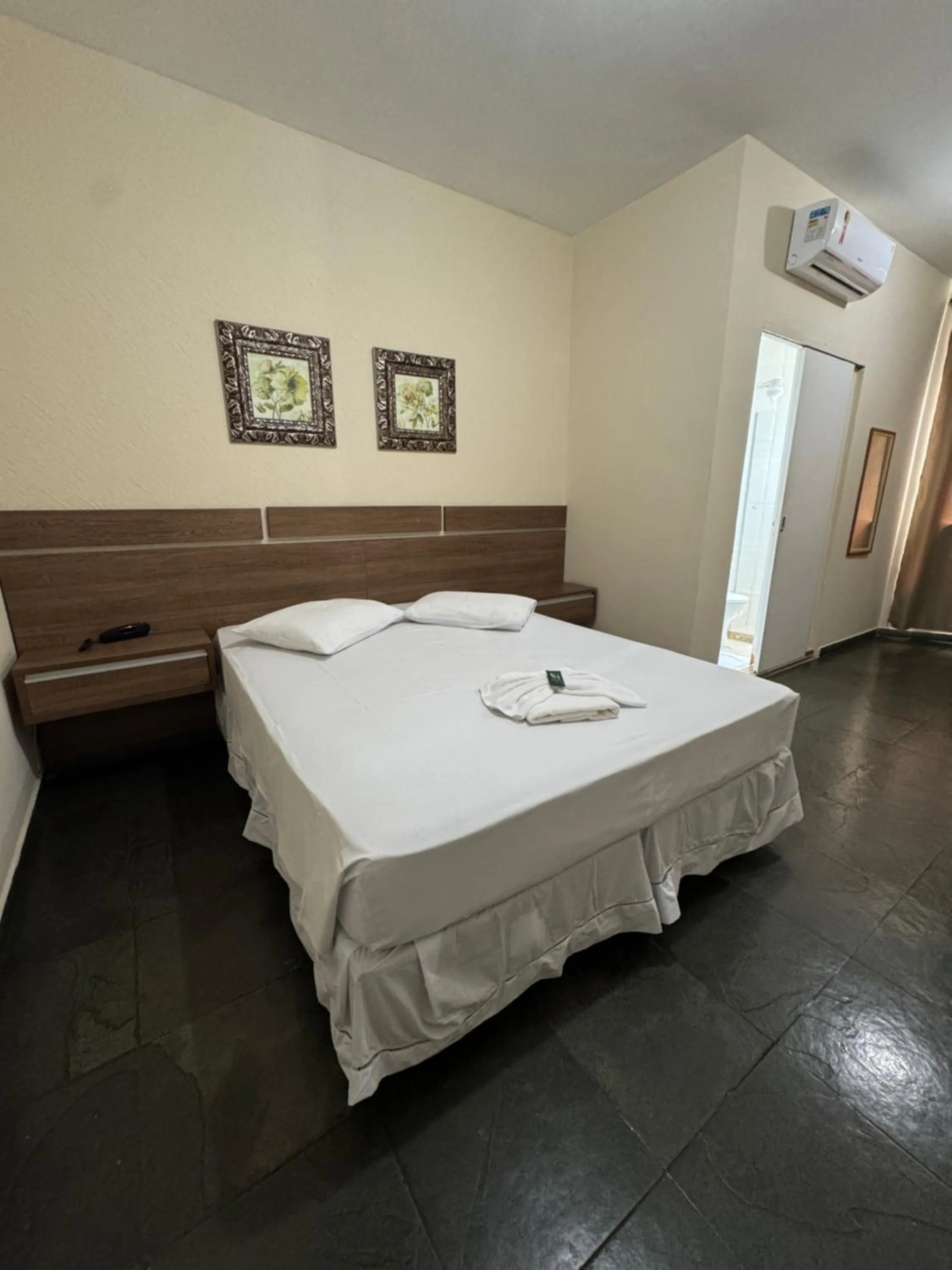 Bed in Hotel Pousada Figueiredo