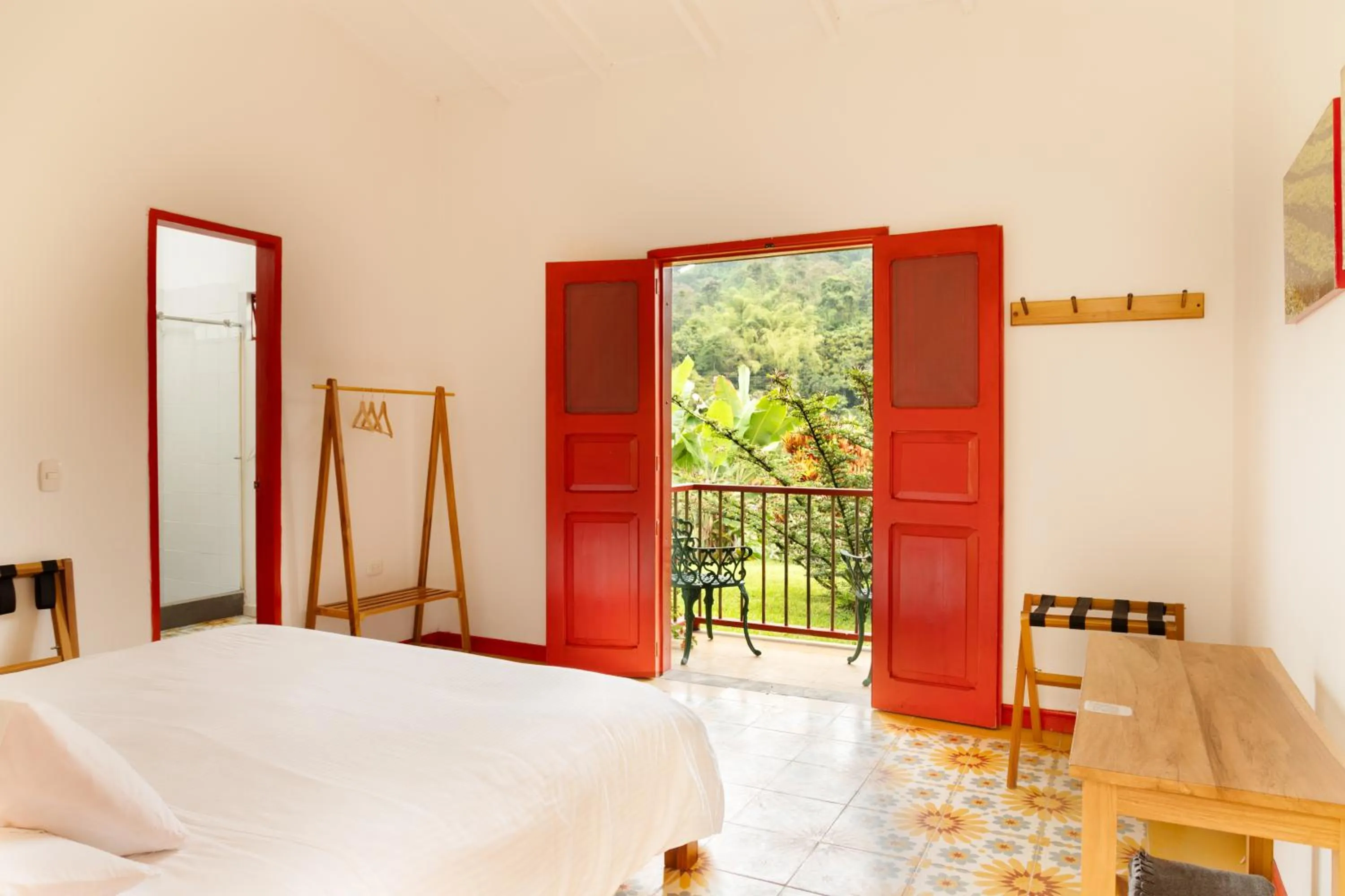 Bed in Hacienda Venecia Coffee Farm Hotel