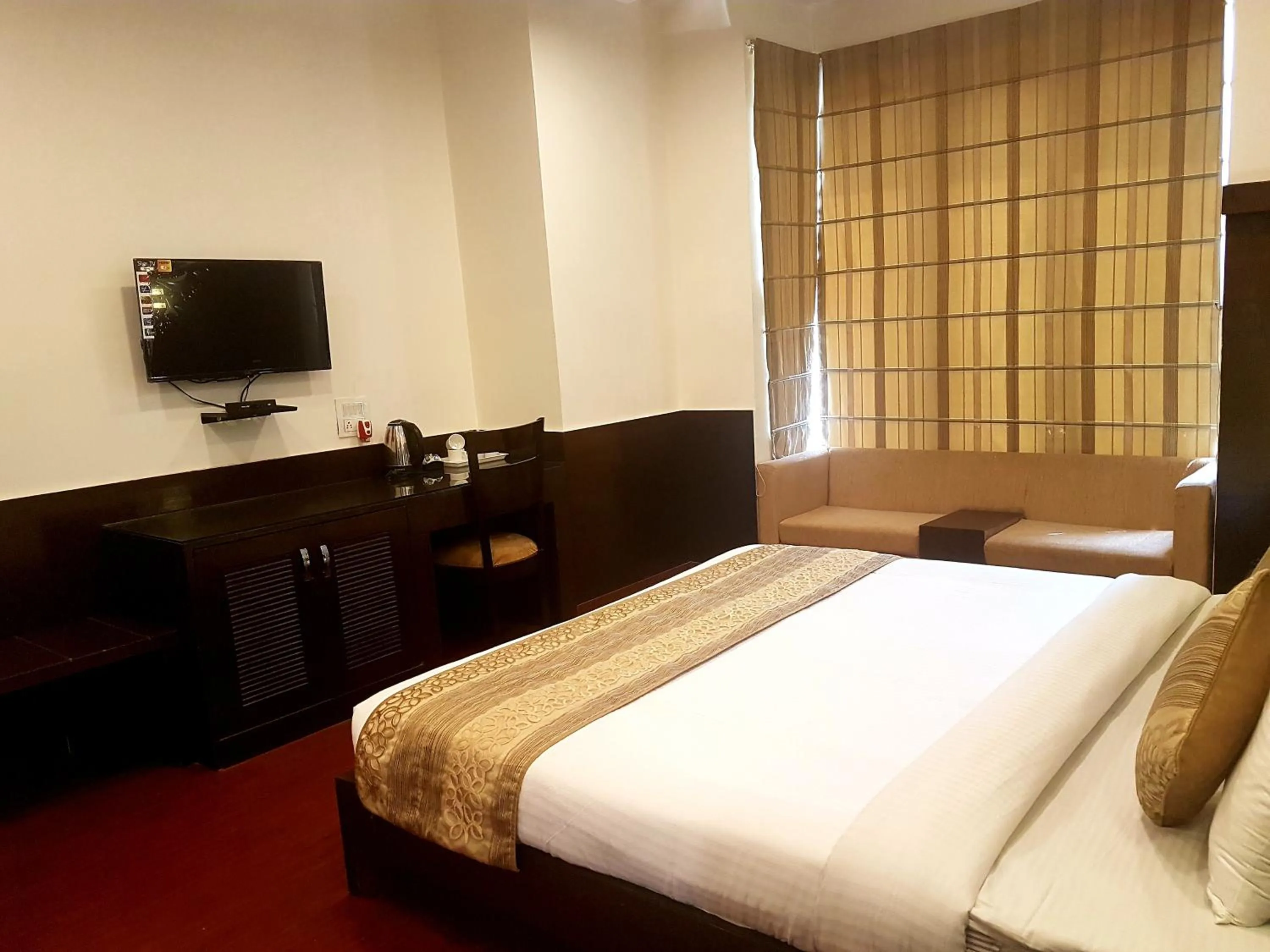 Bedroom, Bed in Hotel Haris MG Road Gurugram