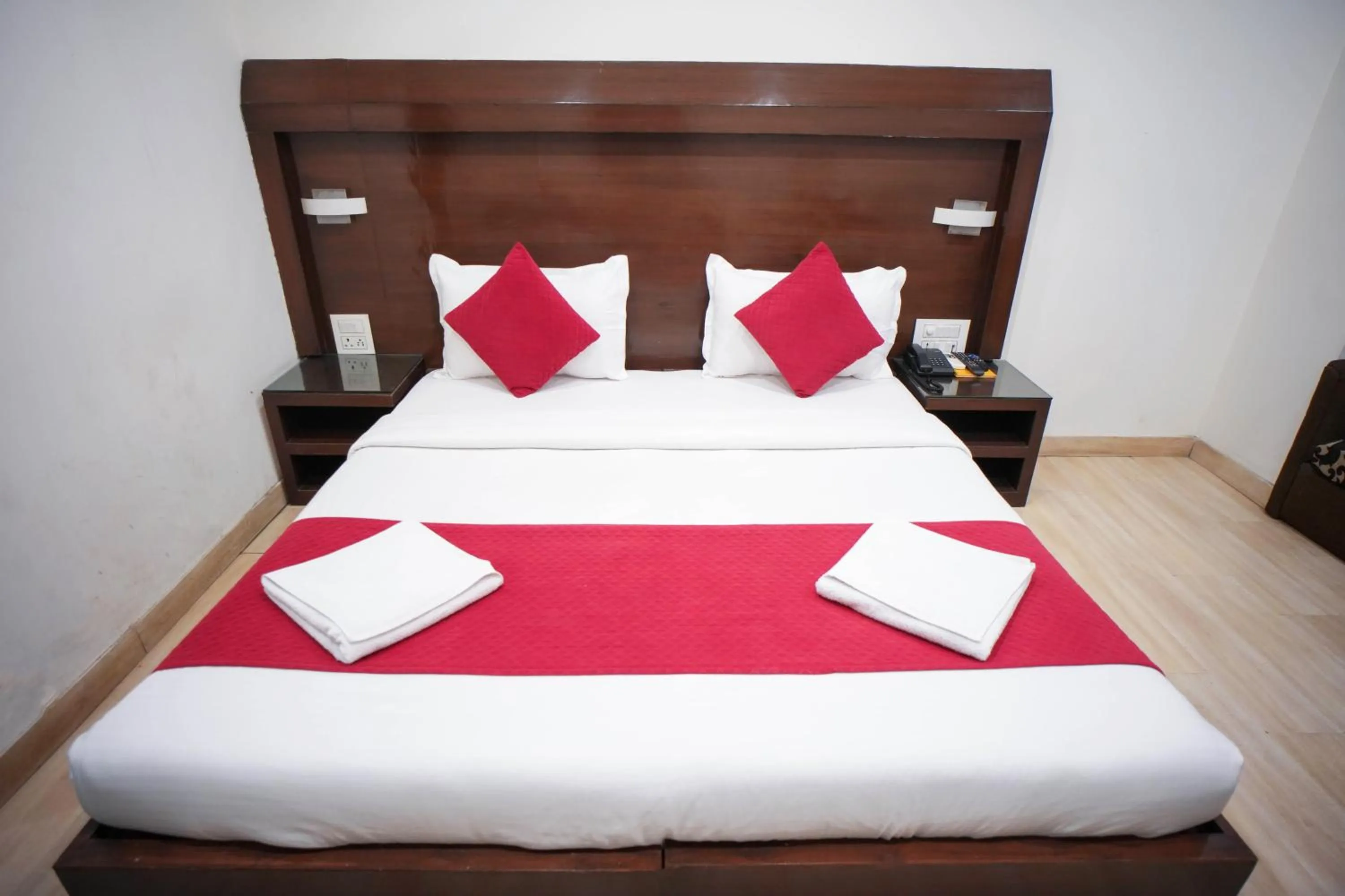 Photo of the whole room, Bed in Hotel Haris MG Road Gurugram