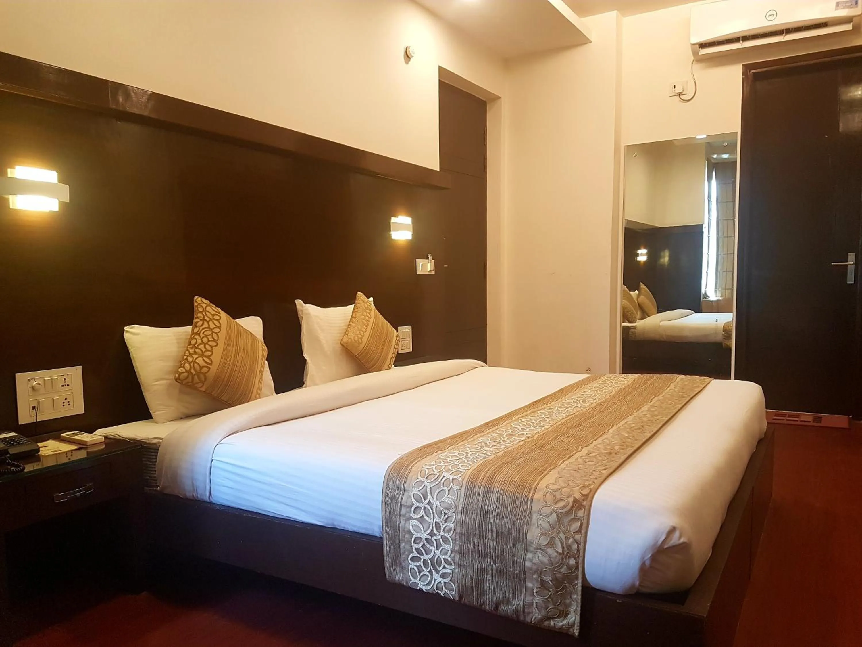 Bed in Hotel Haris MG Road Gurugram