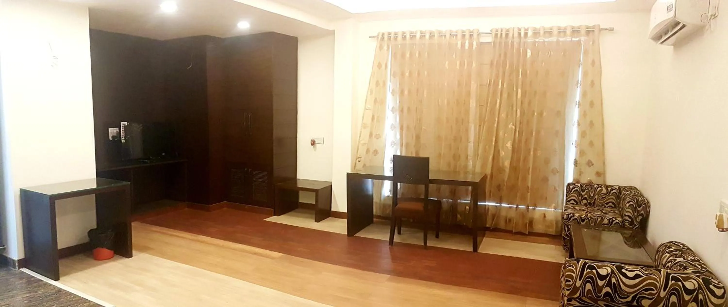 Seating area in Hotel Haris MG Road Gurugram