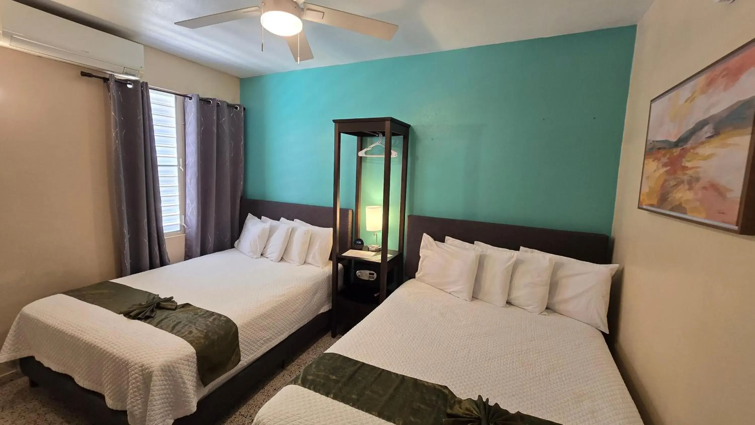 Superior Quadruple Room in I Love Combate Rooms & Suites Superior Quadruple Room in I Love Combate Rooms & Suites