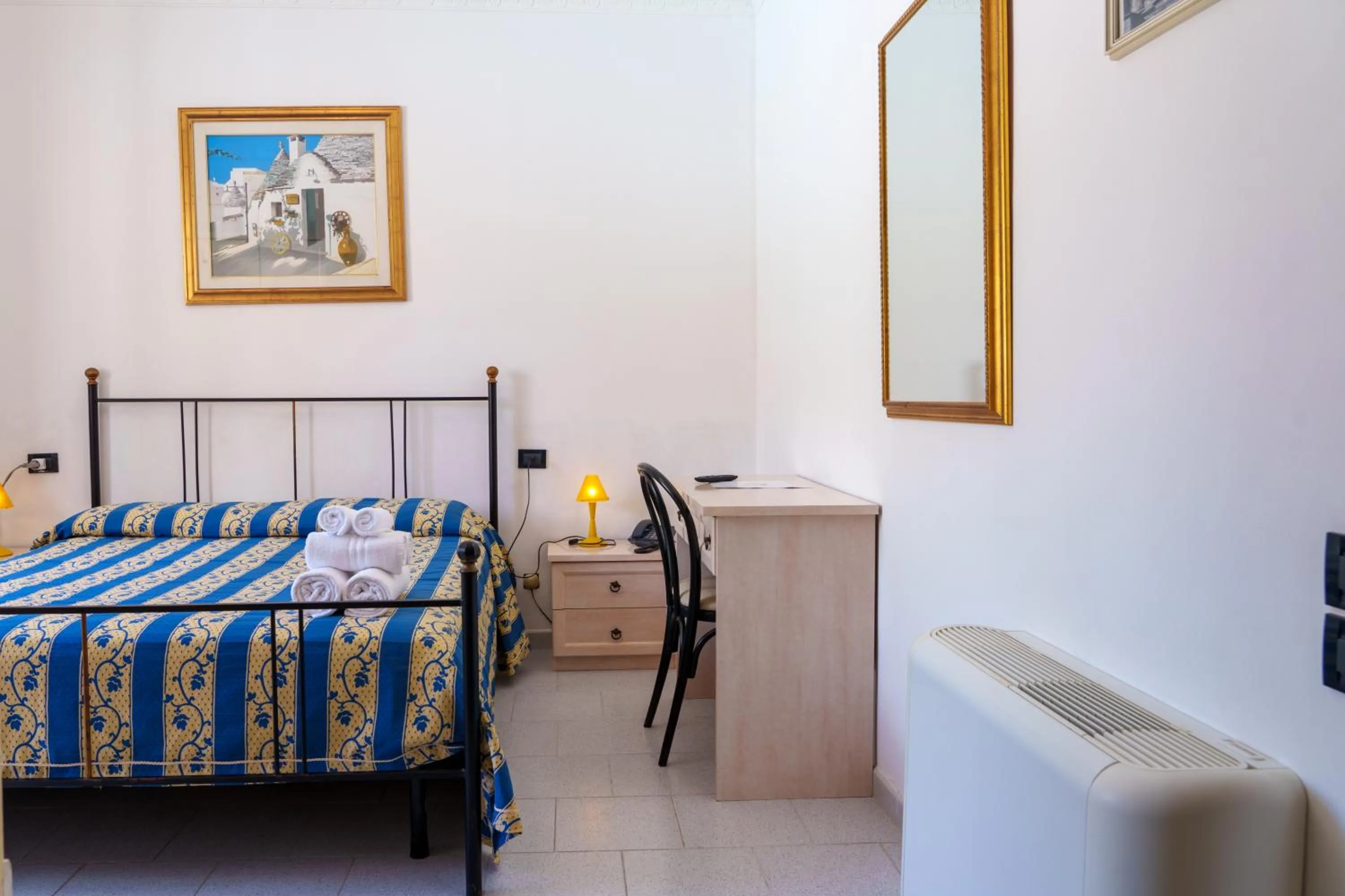 Bedroom in Hotel Le Macine