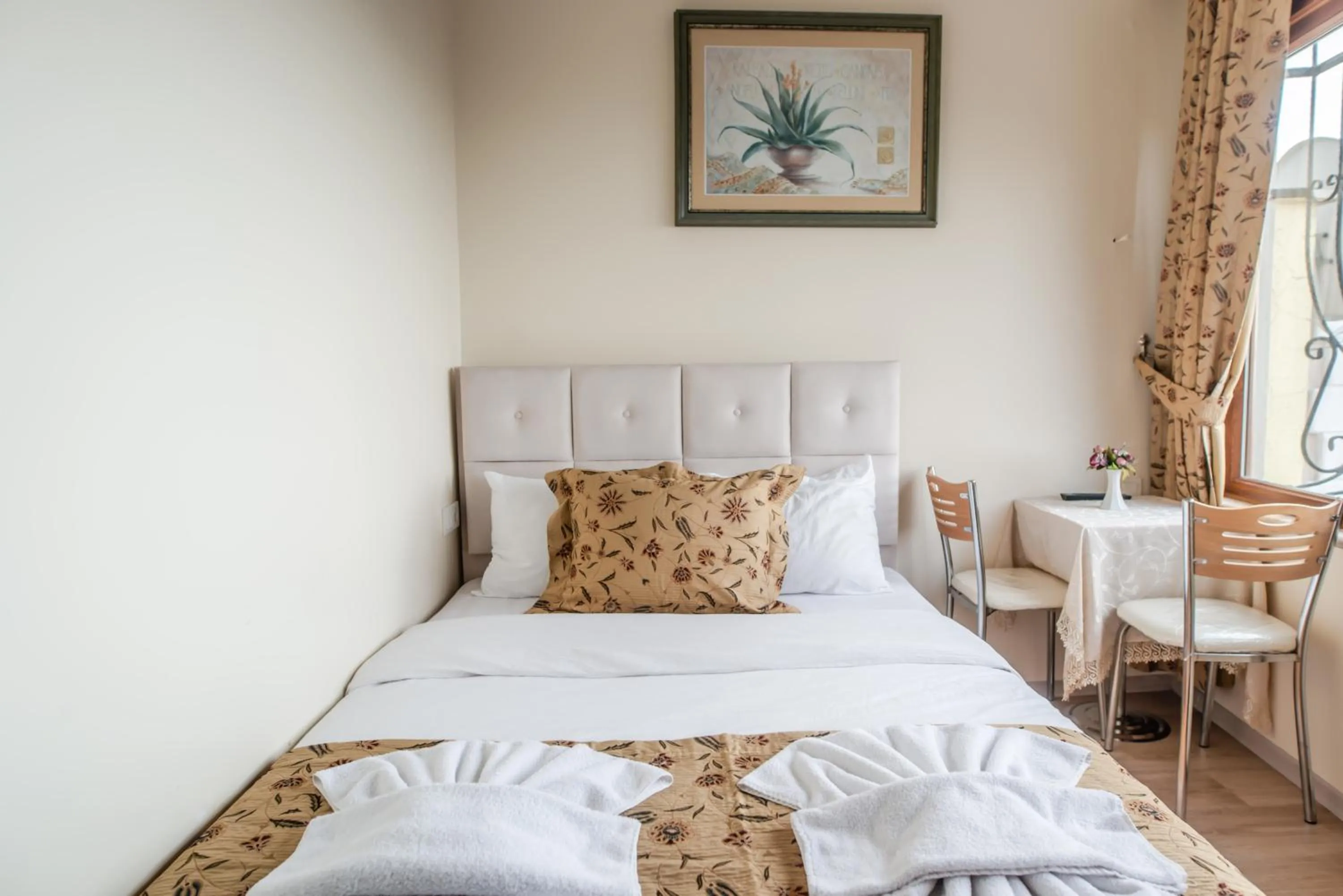 Bed in Camelot Apartment