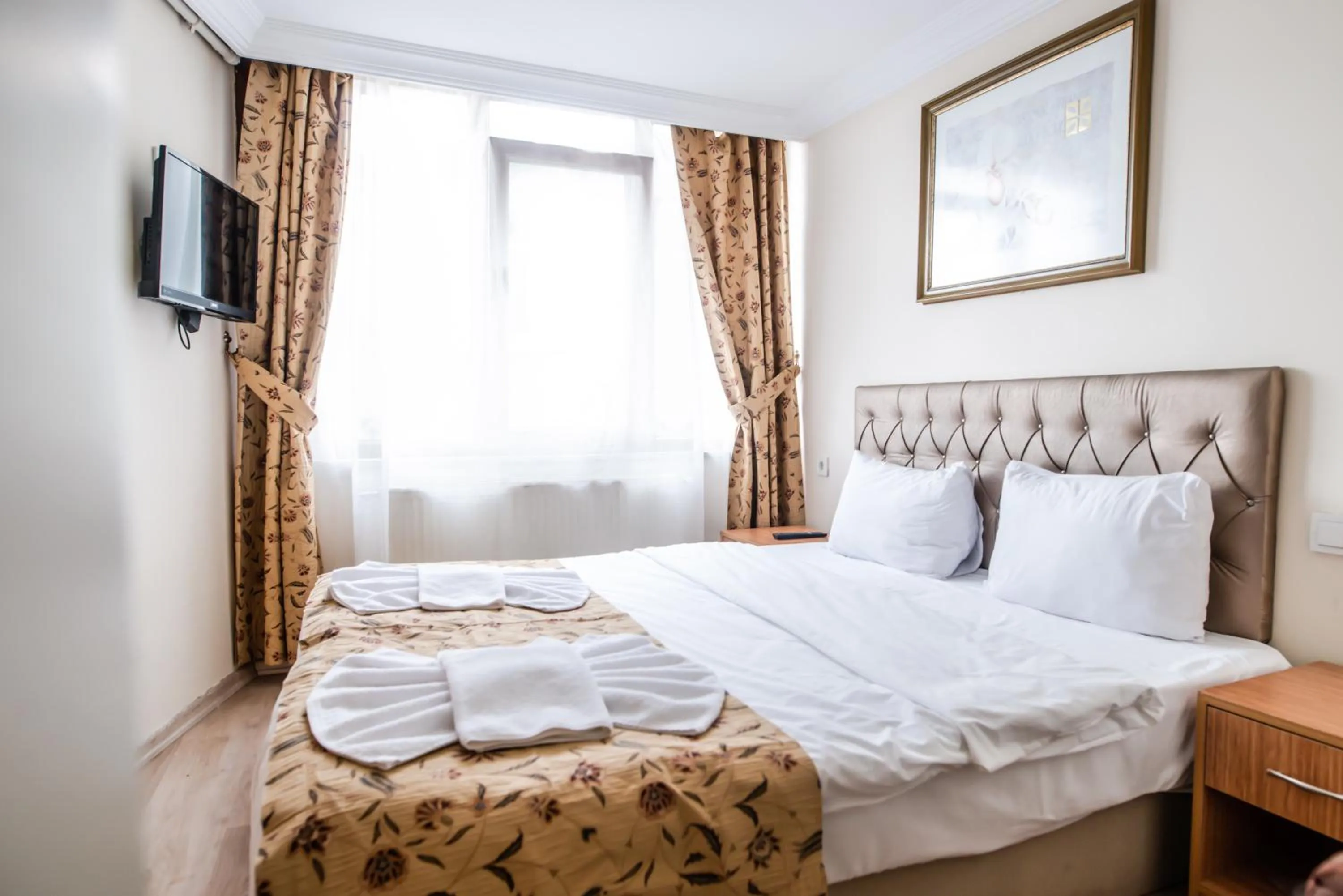 Bed in Camelot Apartment