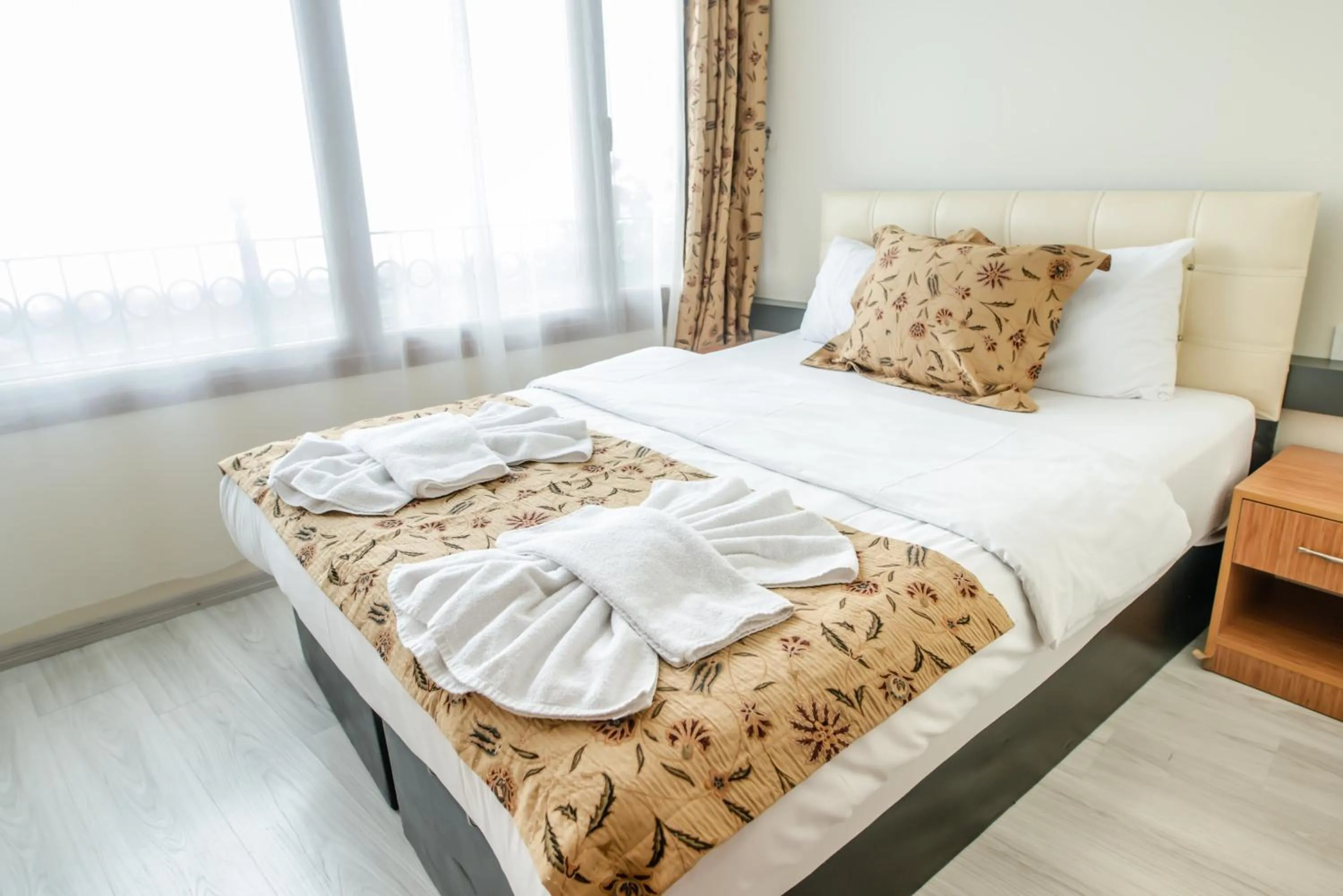 Bed in Camelot Apartment