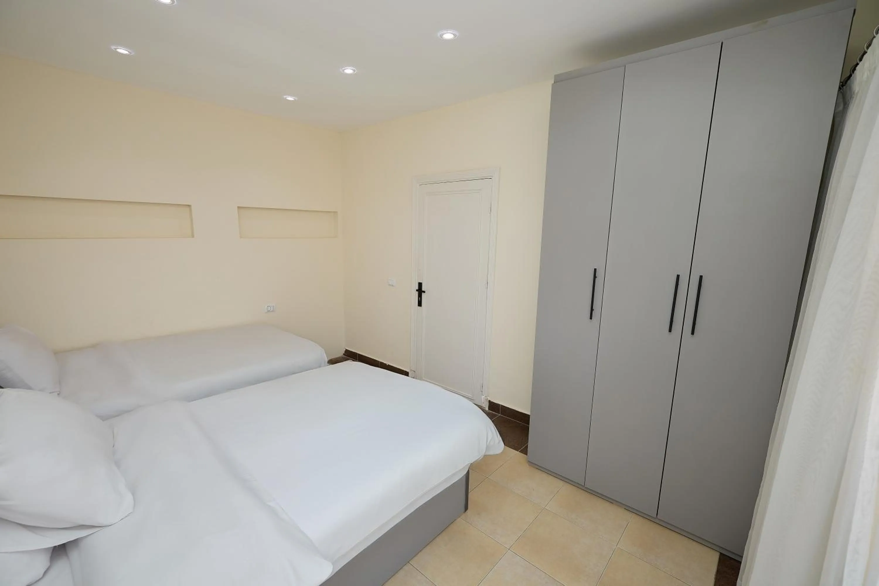 Bed in Settle Inn Al Rehab City A