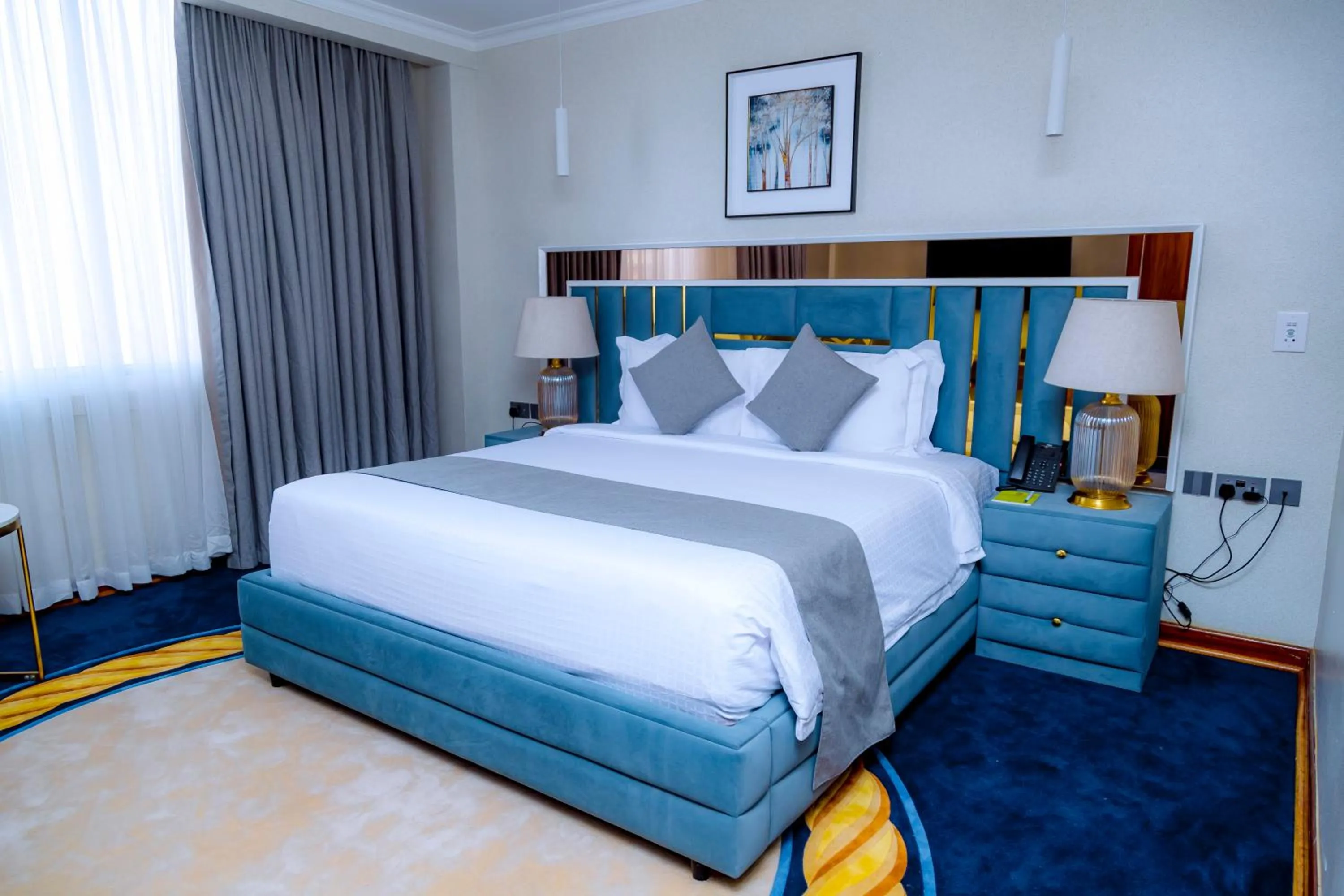 Bed in Kigali Paramount Hotel