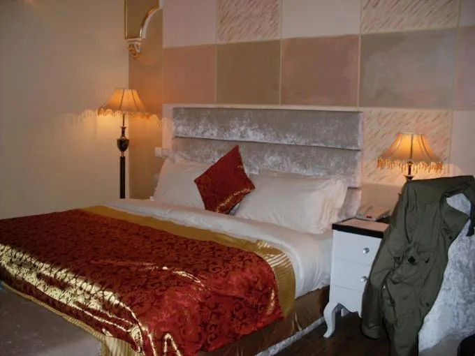 Bed in Sandralia Hotel Limited, Abuja