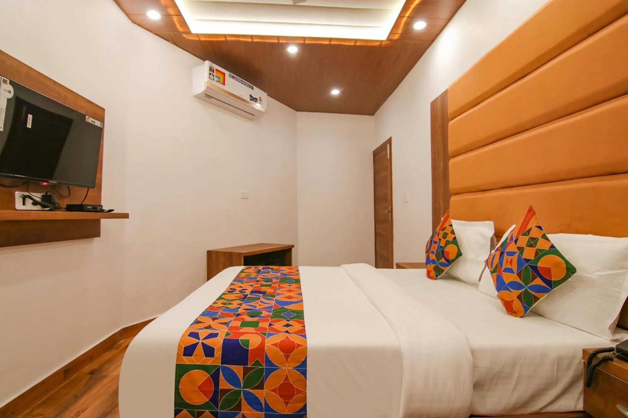 Bed in FabHotel Ambassador