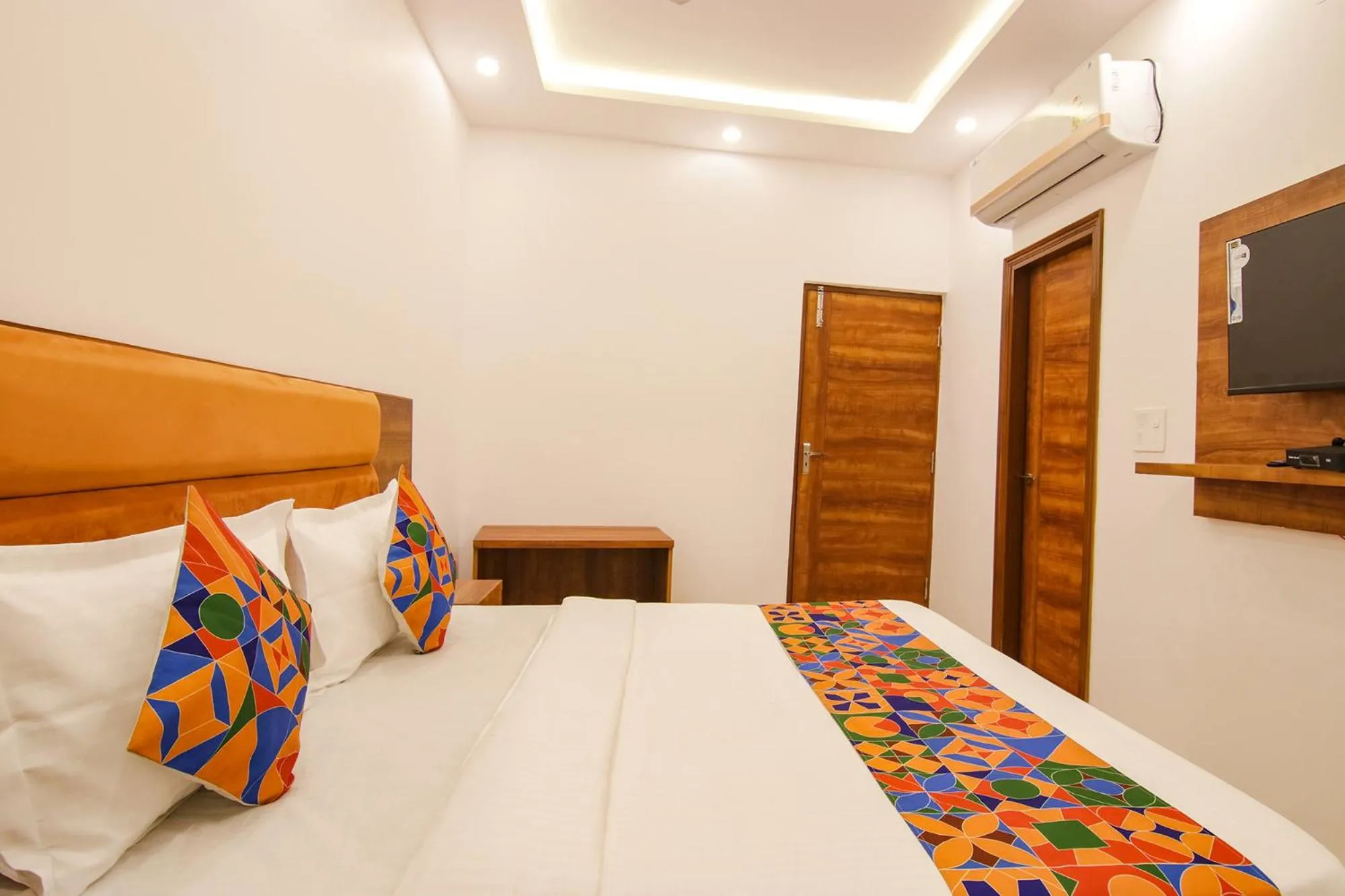 Bed in FabHotel Ambassador