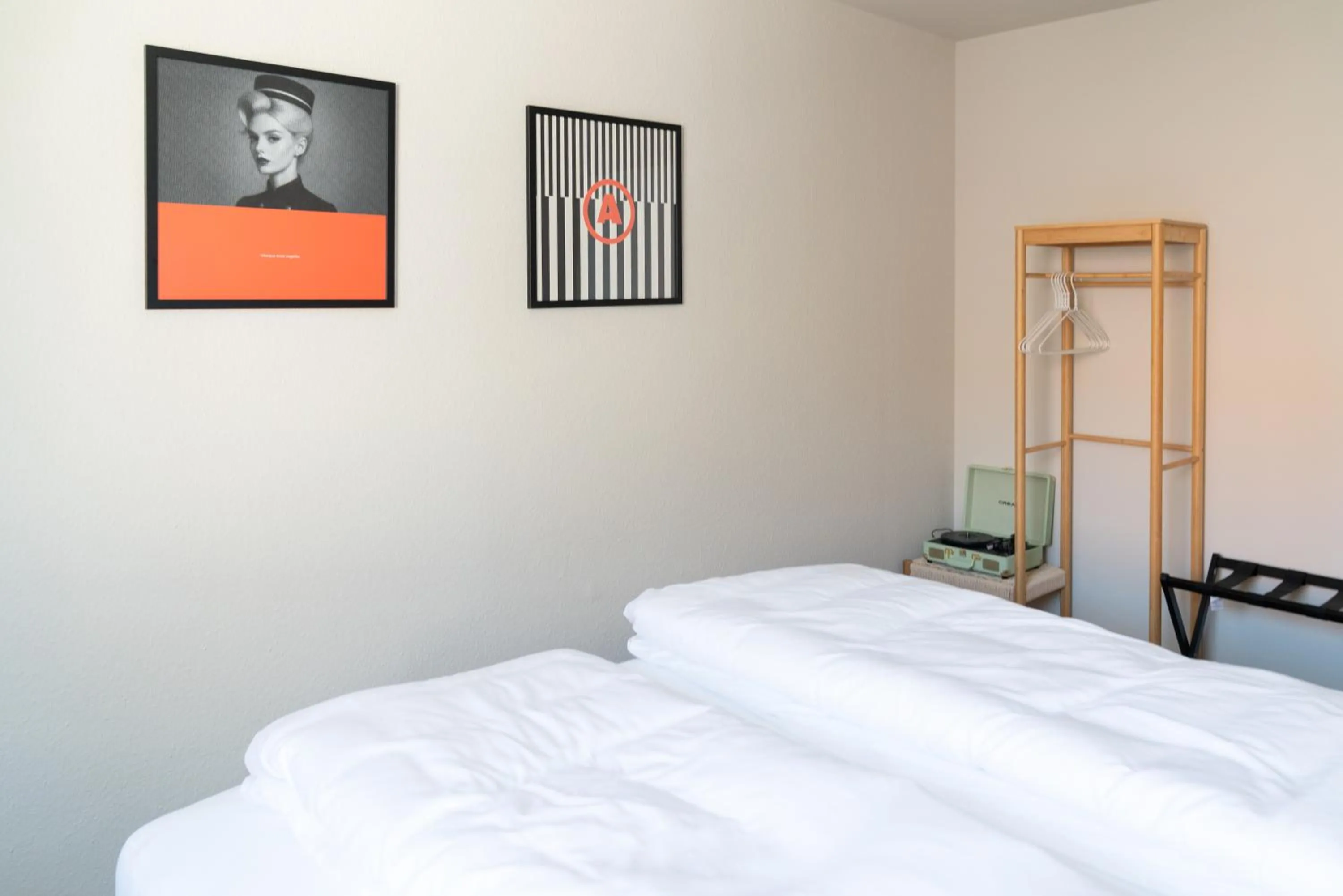 Bed in Velotique Hotel Angelika - Self-Check-in