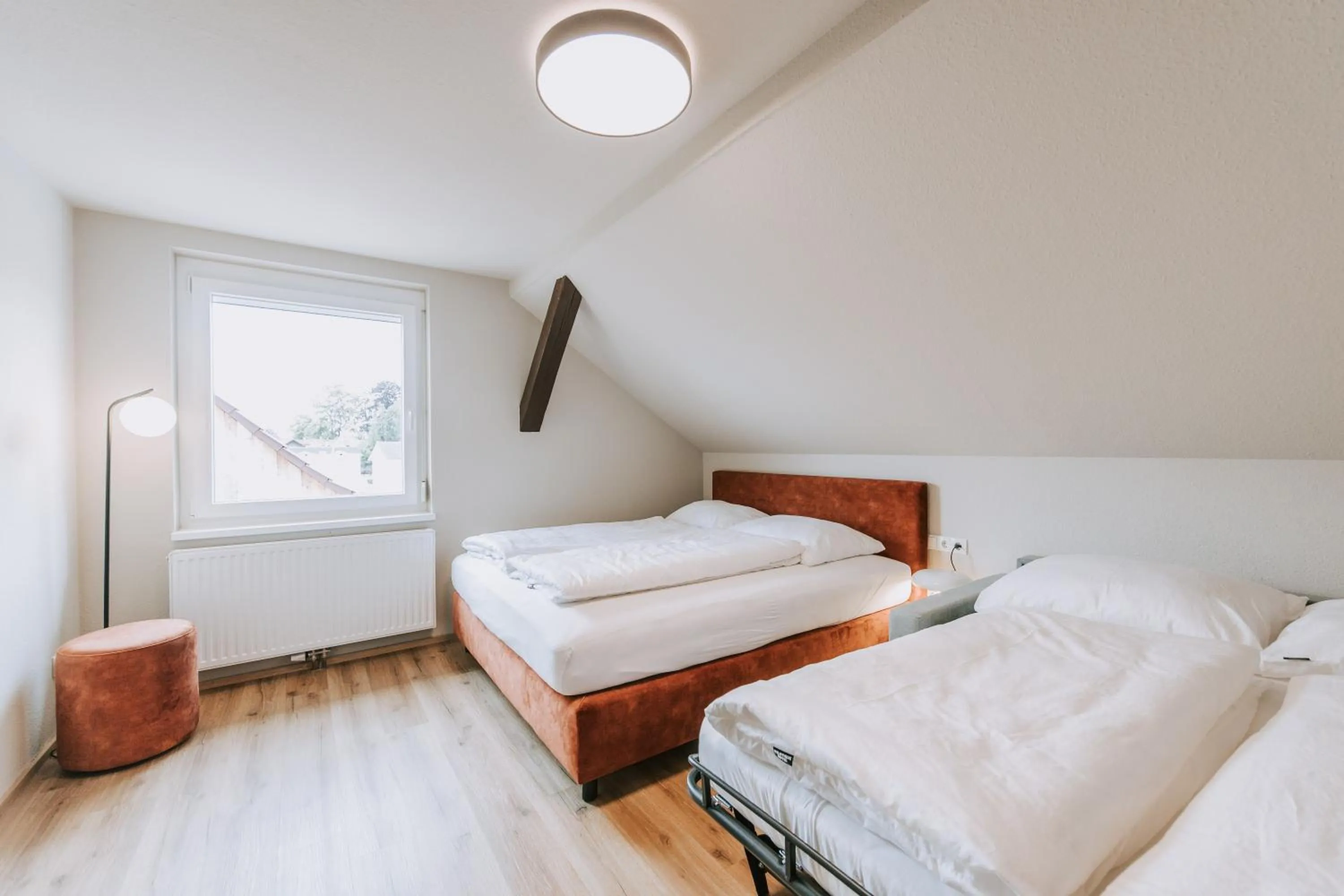 Bed in Velotique Hotel Angelika - Self-Check-in