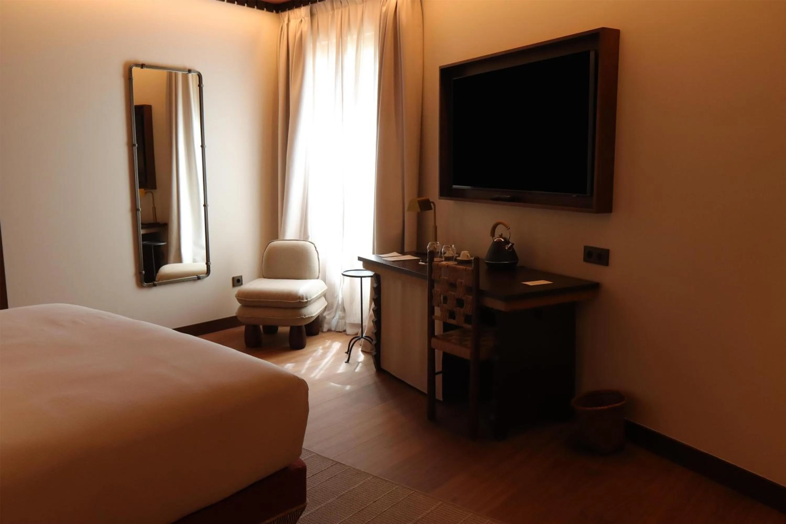 Bed in Palacio De Godoy Caceres, Curio Collection By Hilton