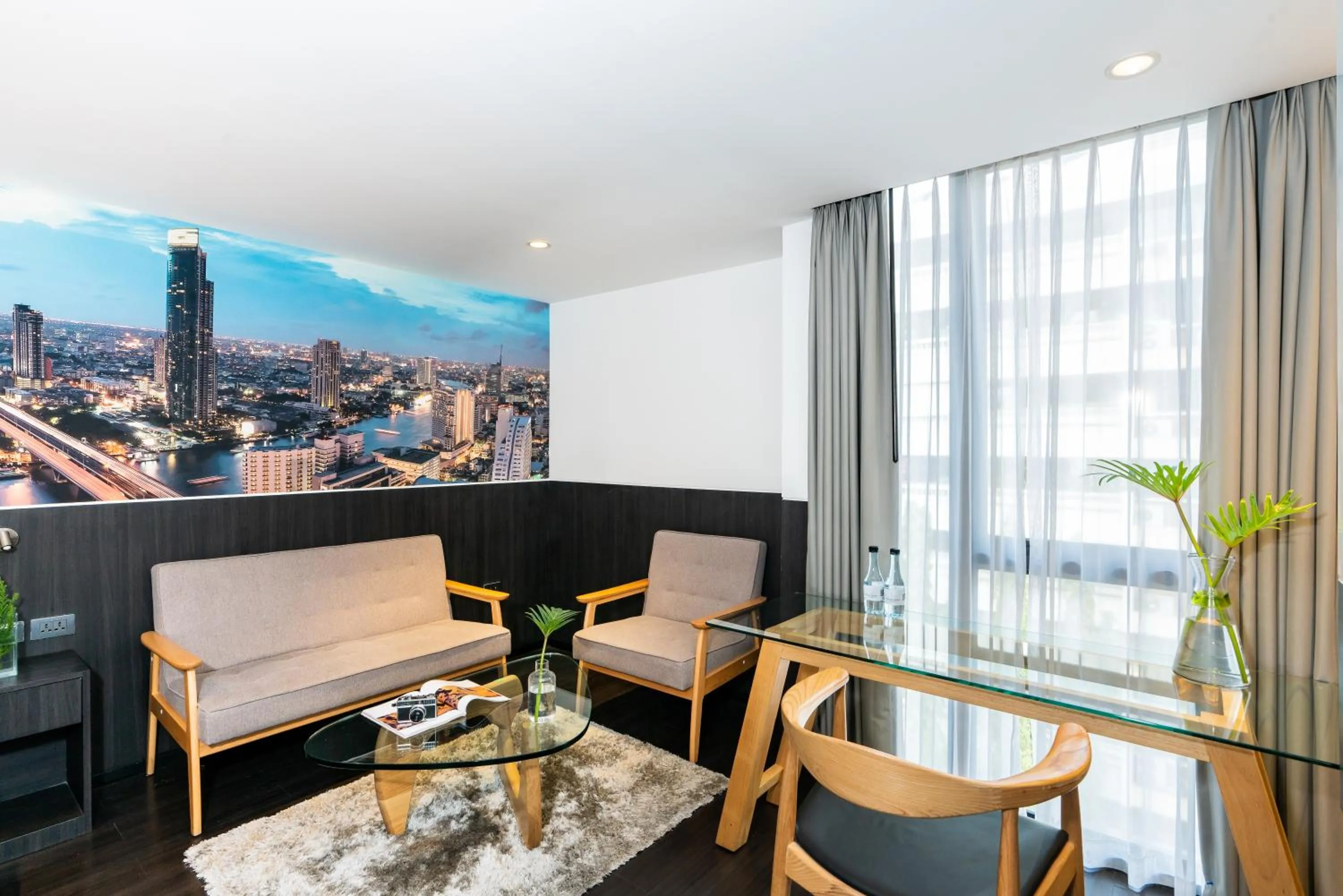 Living room in Galleria 12 Sukhumvit Bangkok by Compass Hospitality