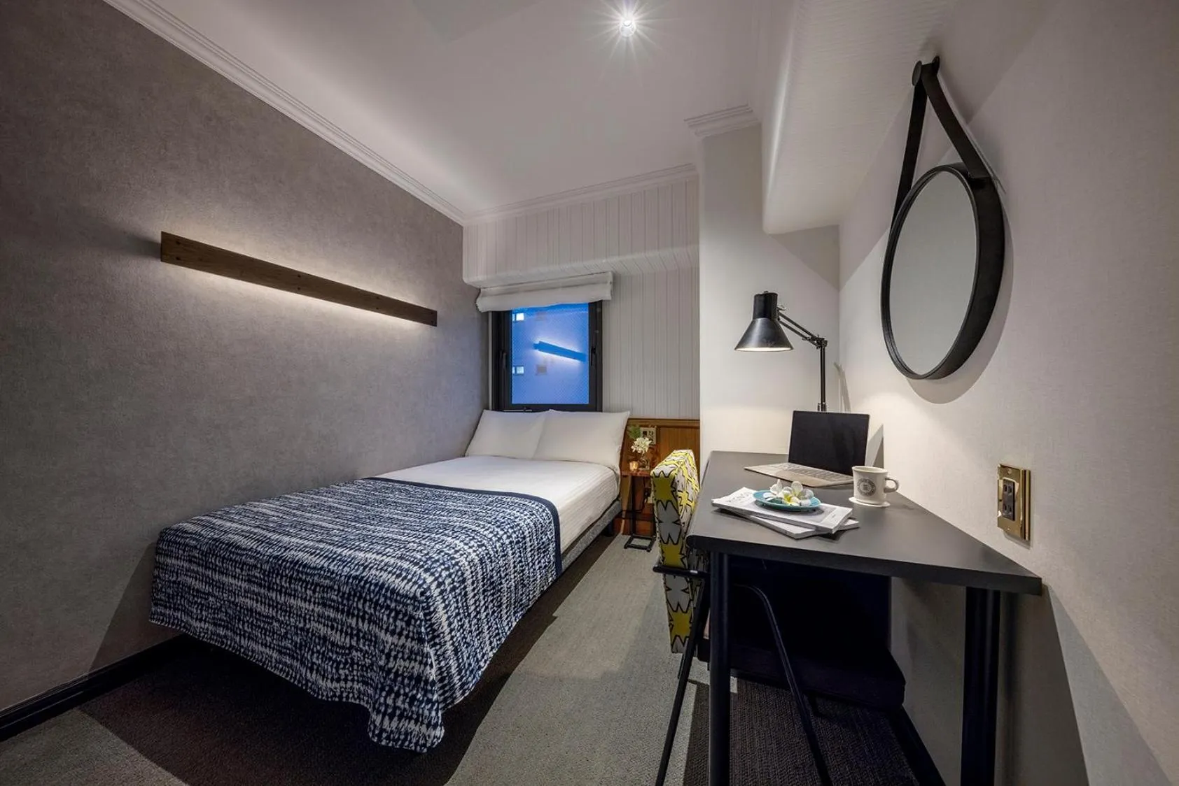 Bed in Estinate Hotel Naha