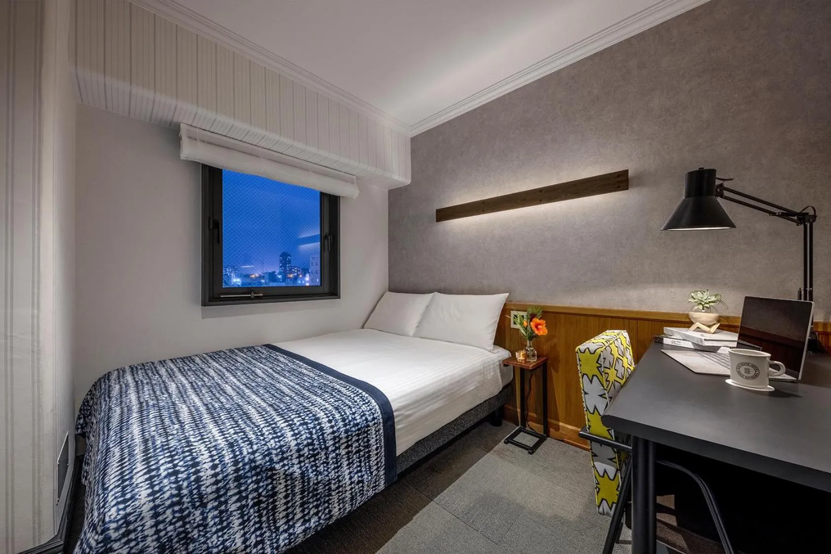 Bed in Estinate Hotel Naha