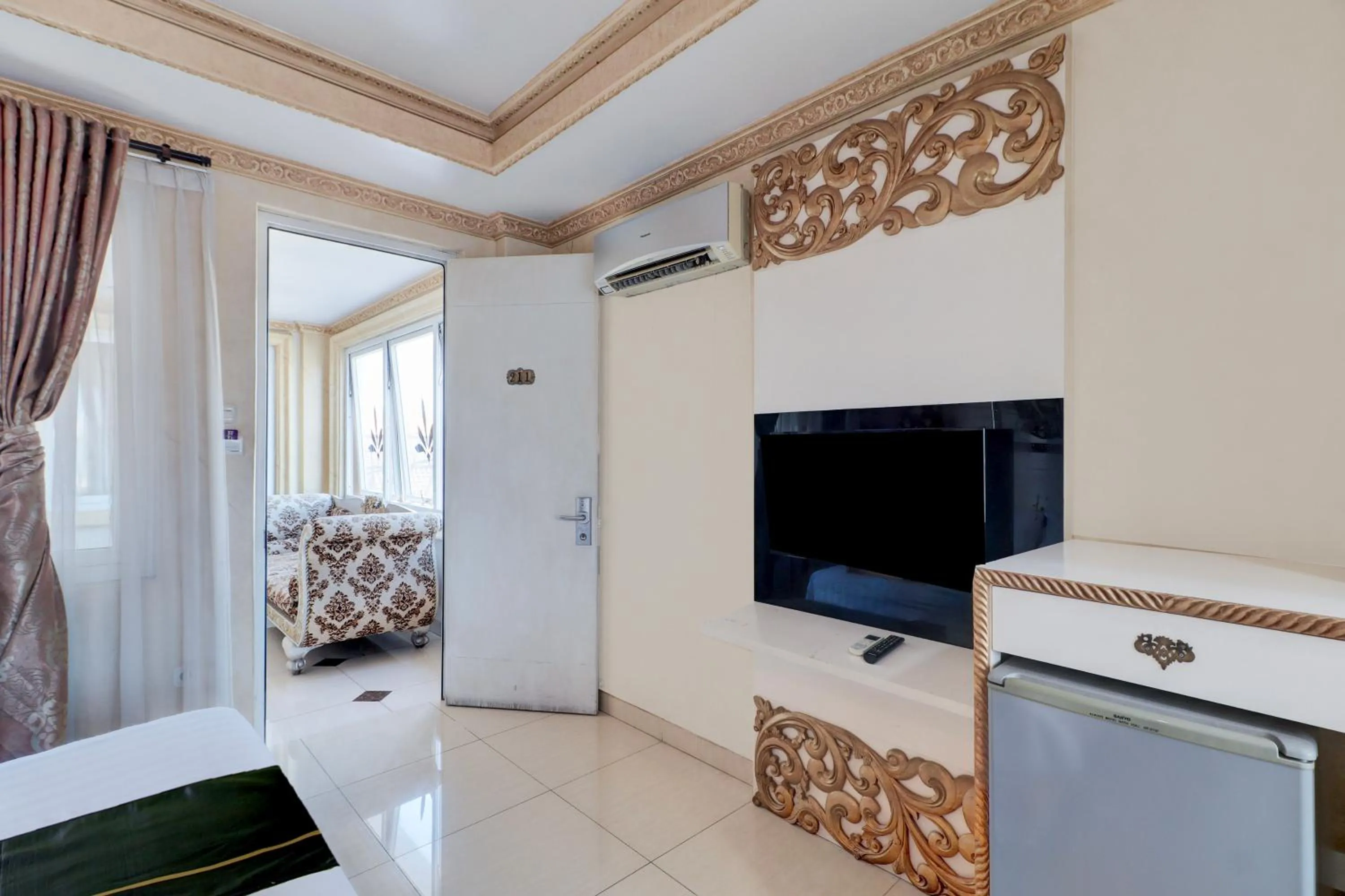 Bedroom in Hotel O My Home@Bali