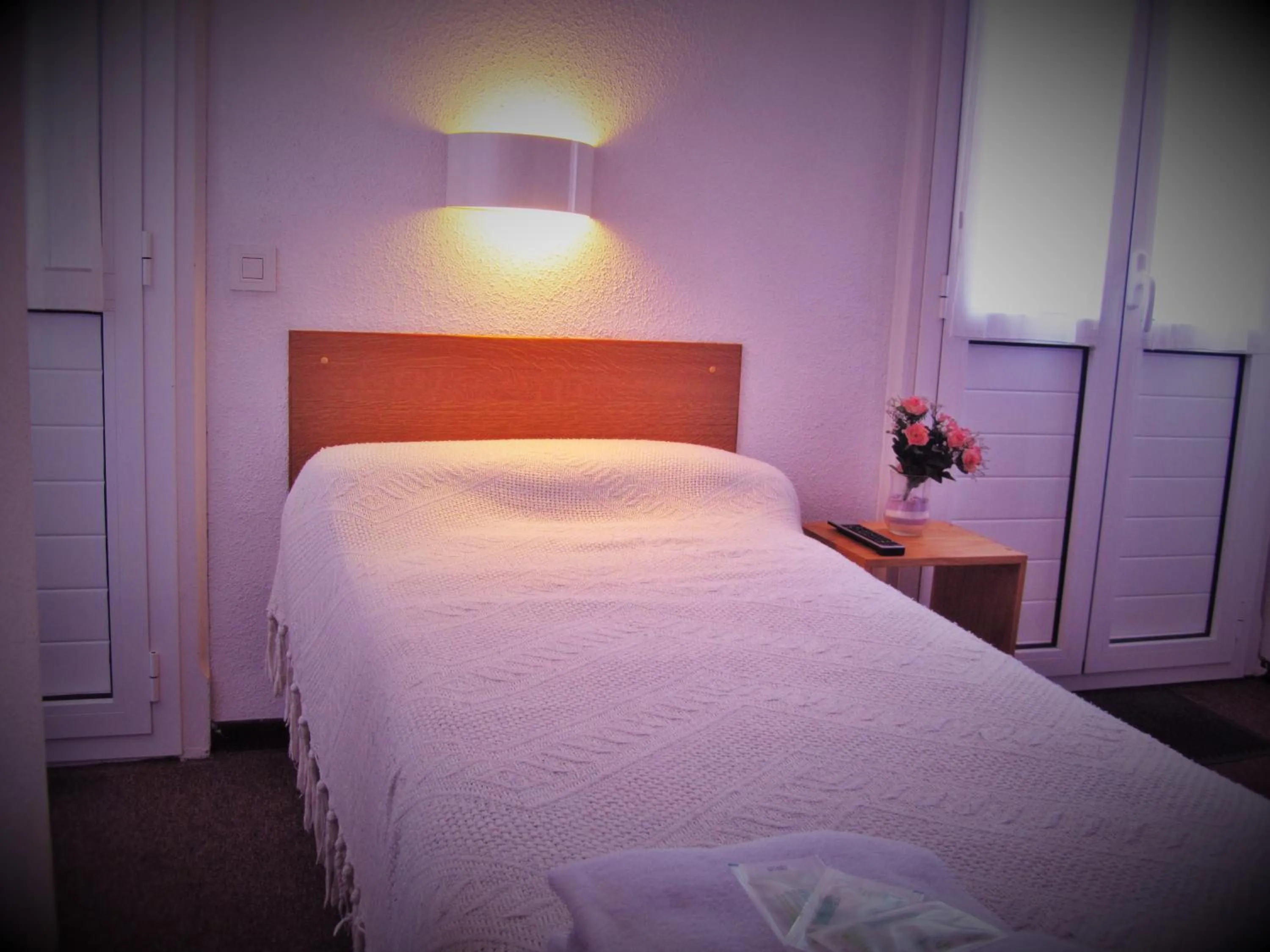 Bed in Hôtel Duchesse Anne