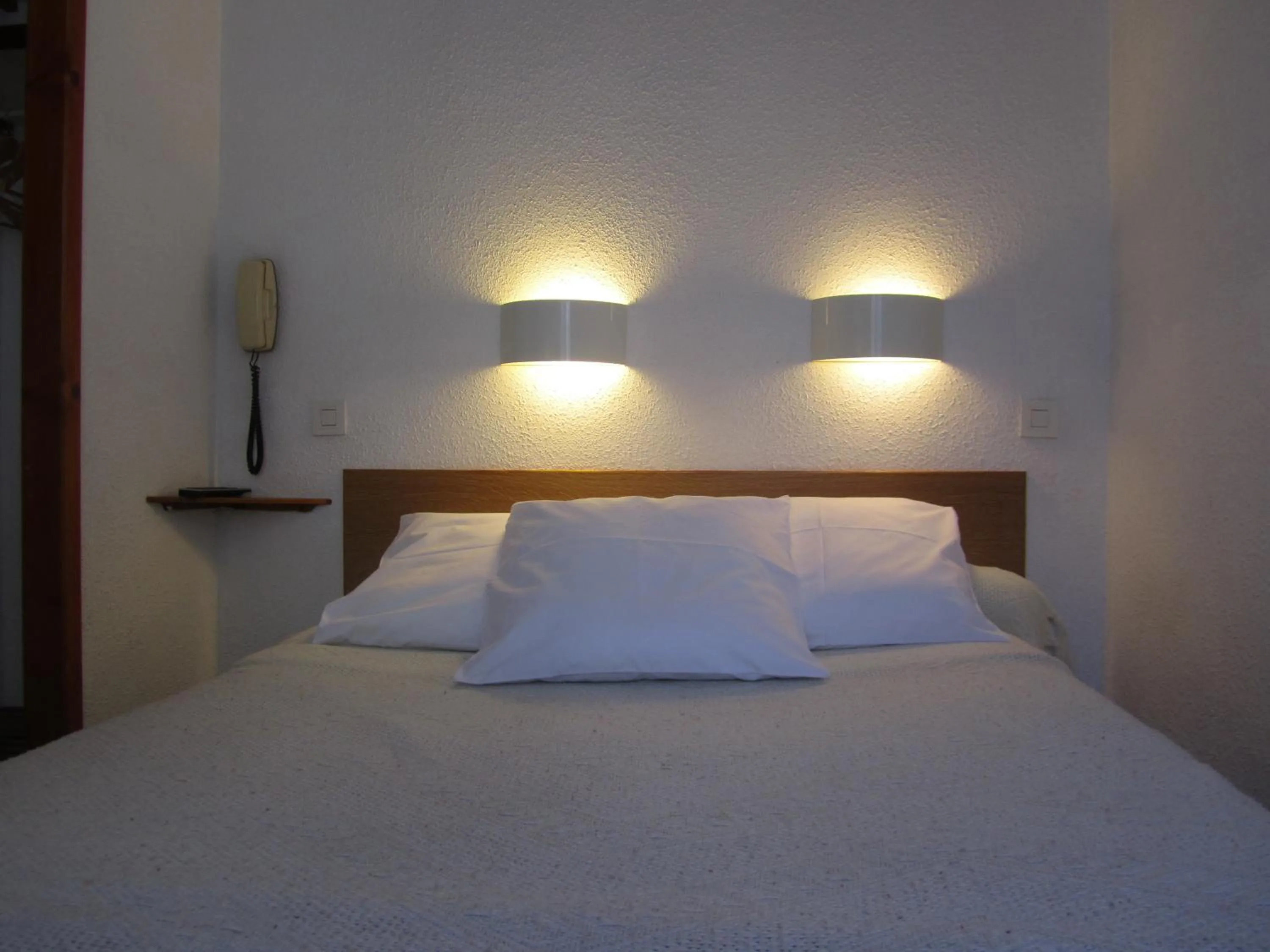 Bed in Hôtel Duchesse Anne