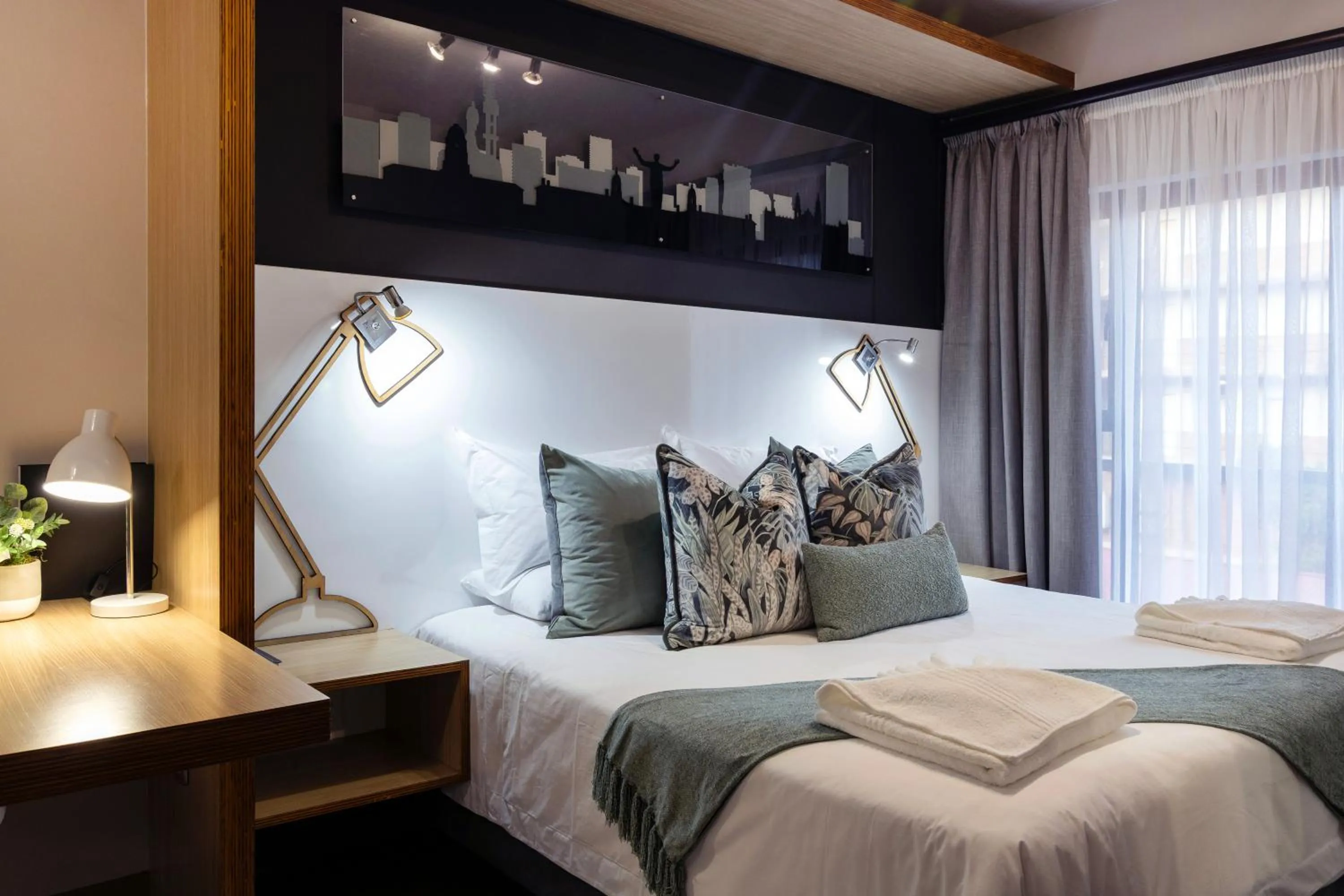 Bed in Akanani Apartments