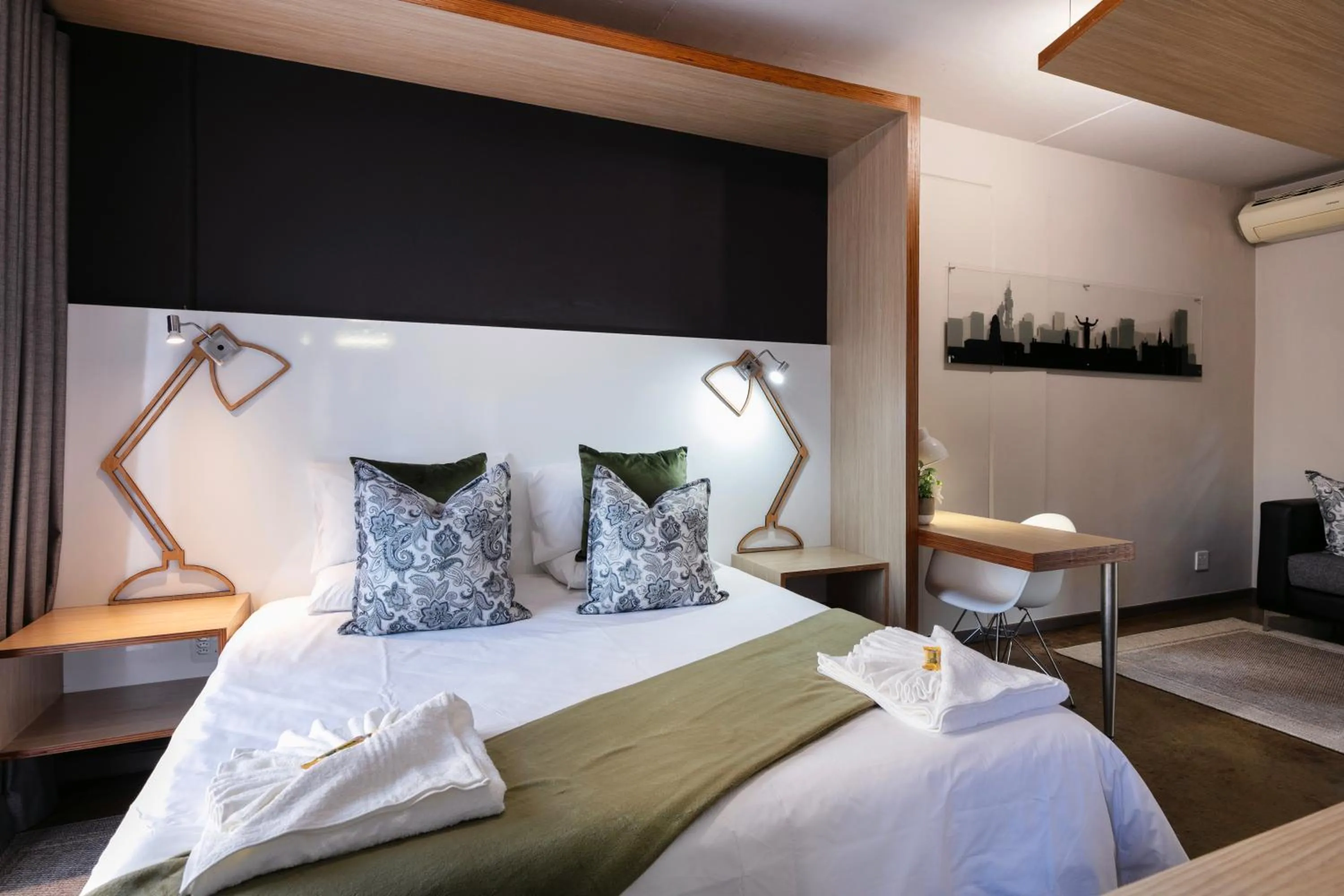 Bed in Akanani Apartments