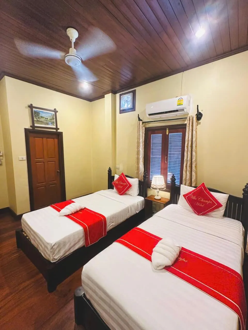 Photo of the whole room, Bed in Luang Prabang Champa Villa Hotel