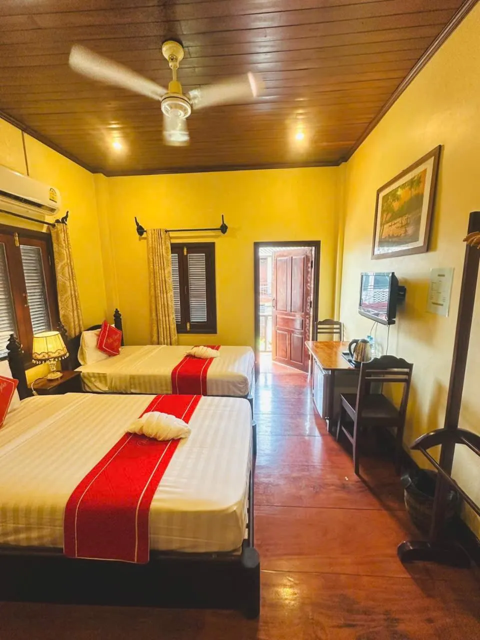 Bed in Luang Prabang Champa Villa Hotel