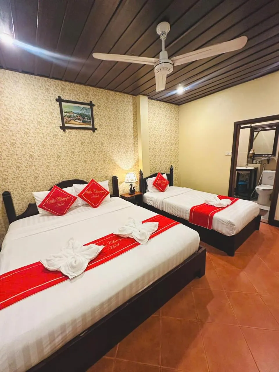 Bed in Luang Prabang Champa Villa Hotel