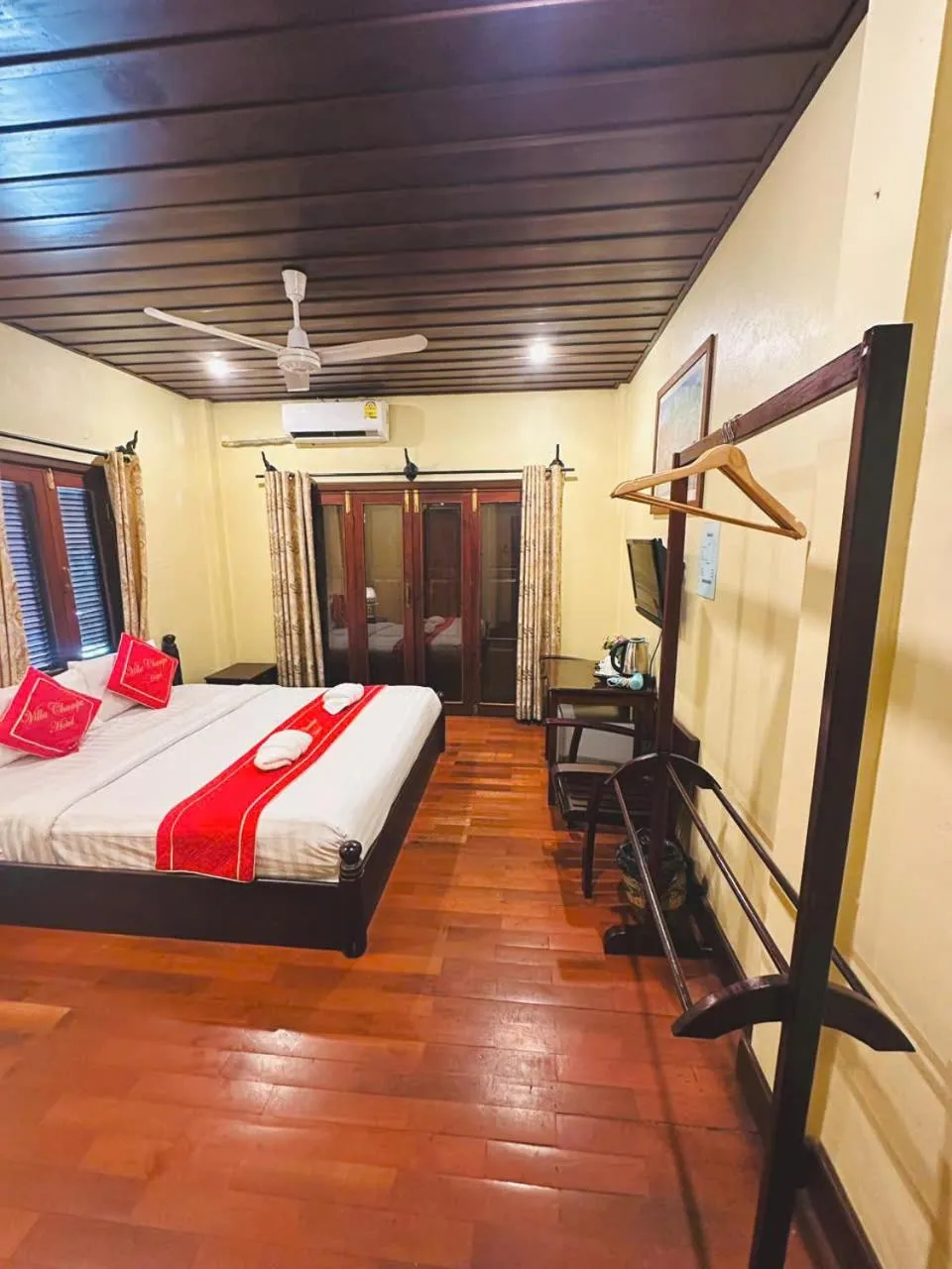 Bed in Luang Prabang Champa Villa Hotel