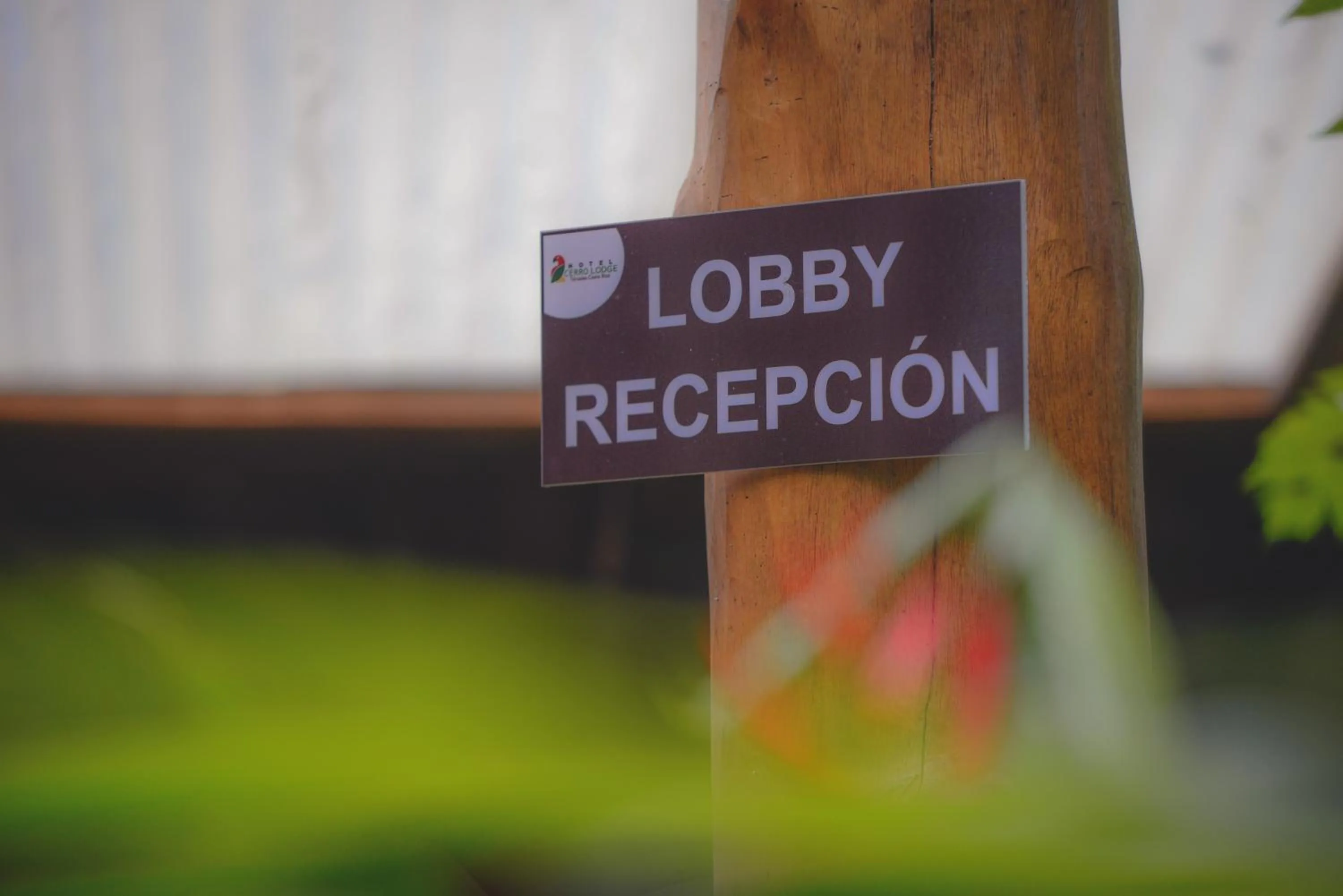 Property logo or sign in Hotel Cerro Lodge